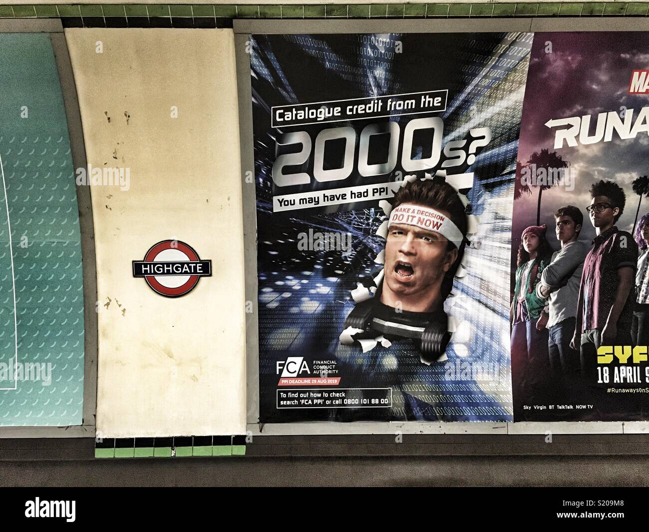 A FCA advert featuring Arnold Schwarzenegger at Highgate Underground station in London, England Stock Photo