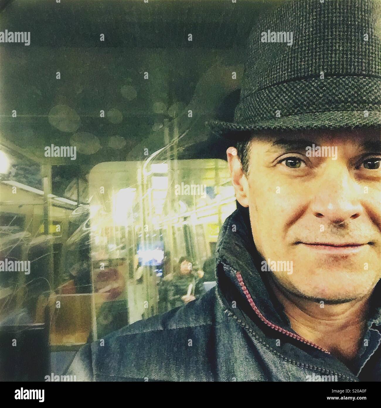 Man on New York City subway Stock Photo