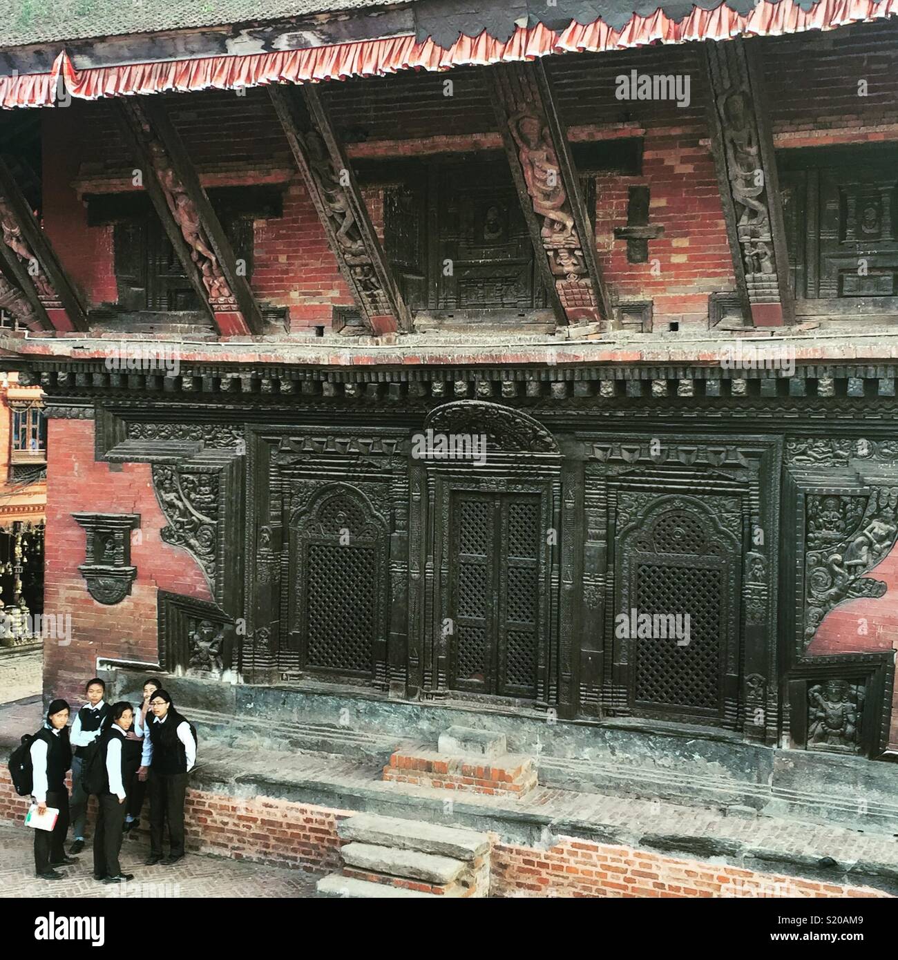 Bhaktapur Temple & schoolgirls, Nepal - Smartphone Captured Stock Image