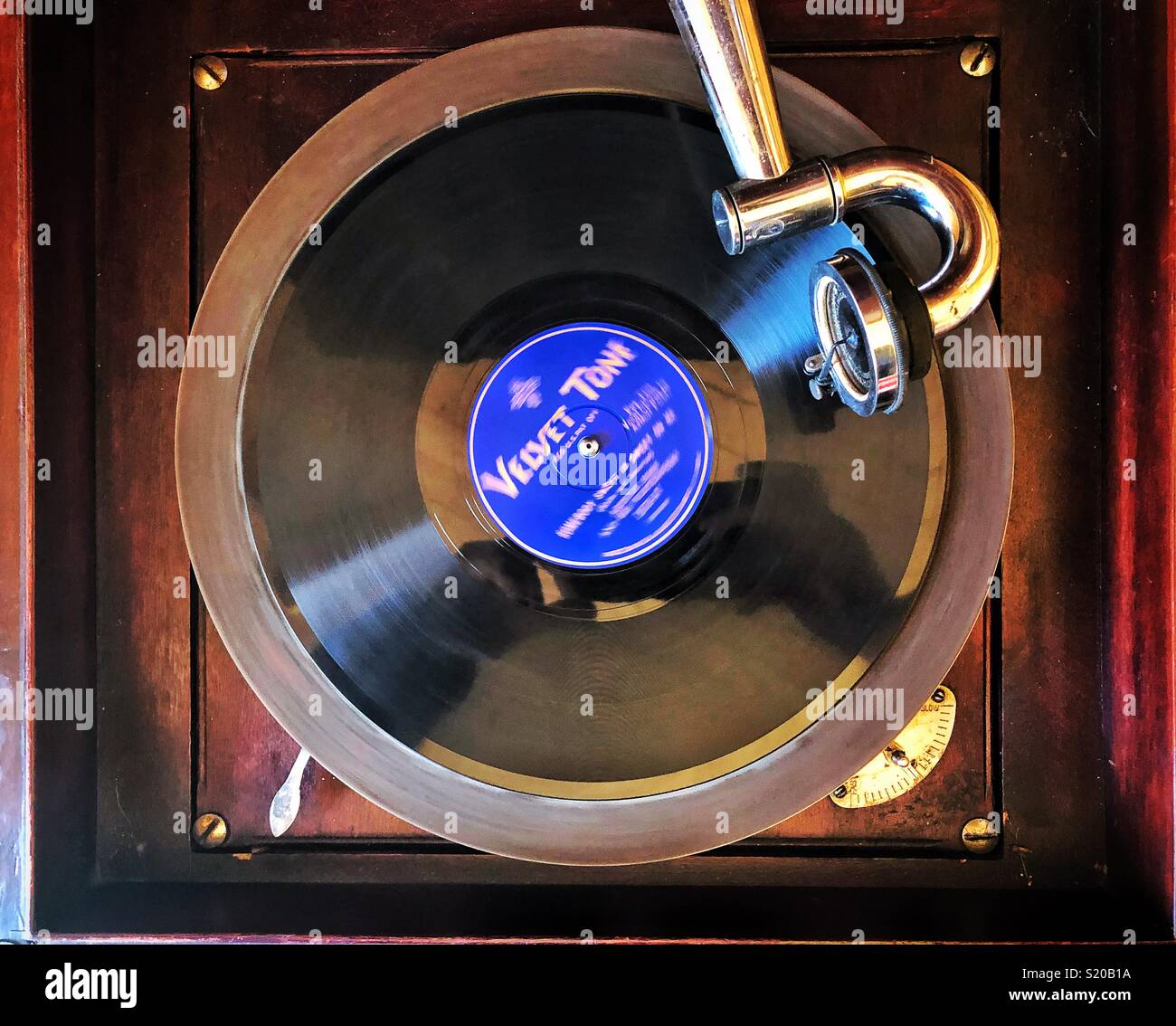 Vintage record playing on real Victrola player Stock Photo Alamy