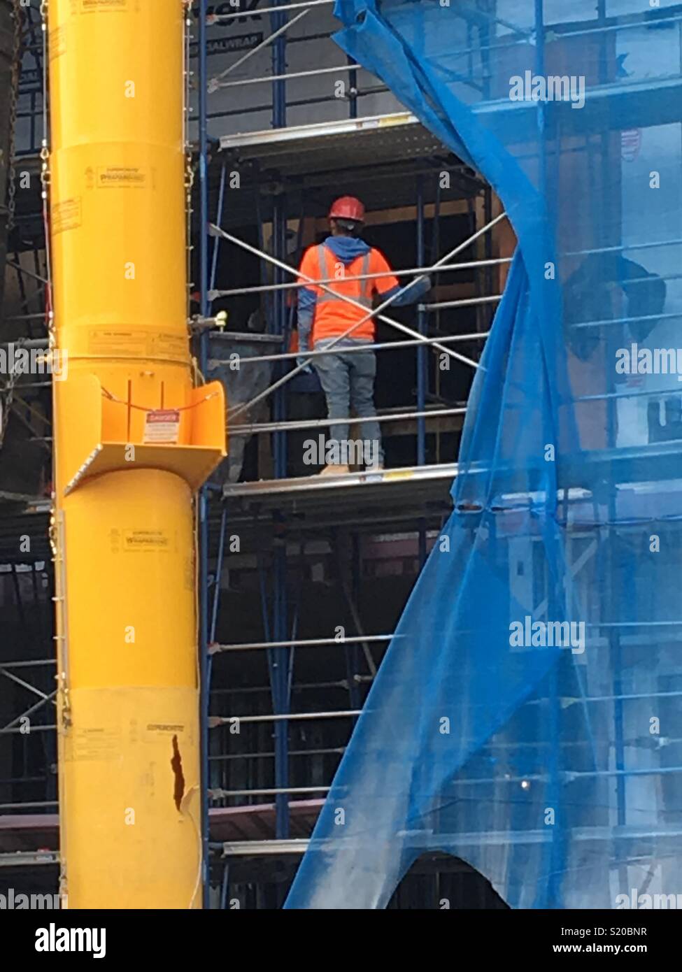 Construction worker on one of the many sites under construction in Seattle, Washington. Stock Photo