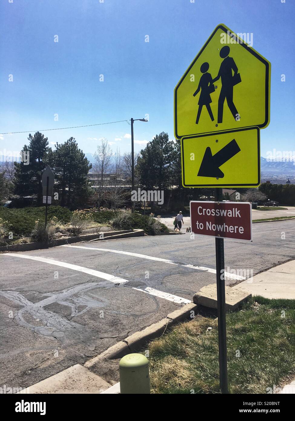 A sign reading crosswalk to nowhere, located in Salt Lake City, UT. Stock Photo