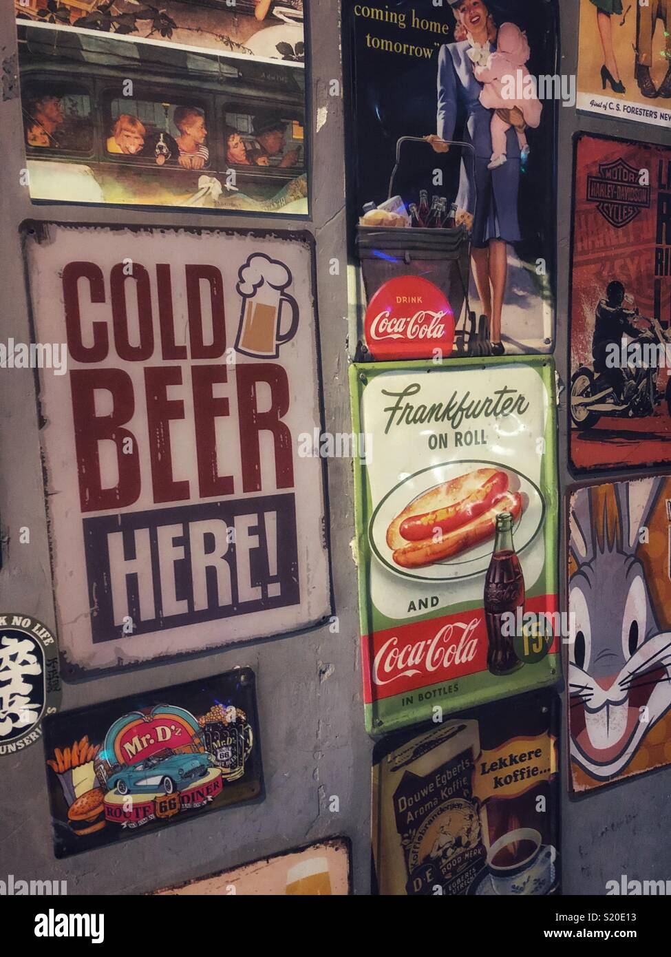 Vintage signs on a restaurant wall. Stock Photo