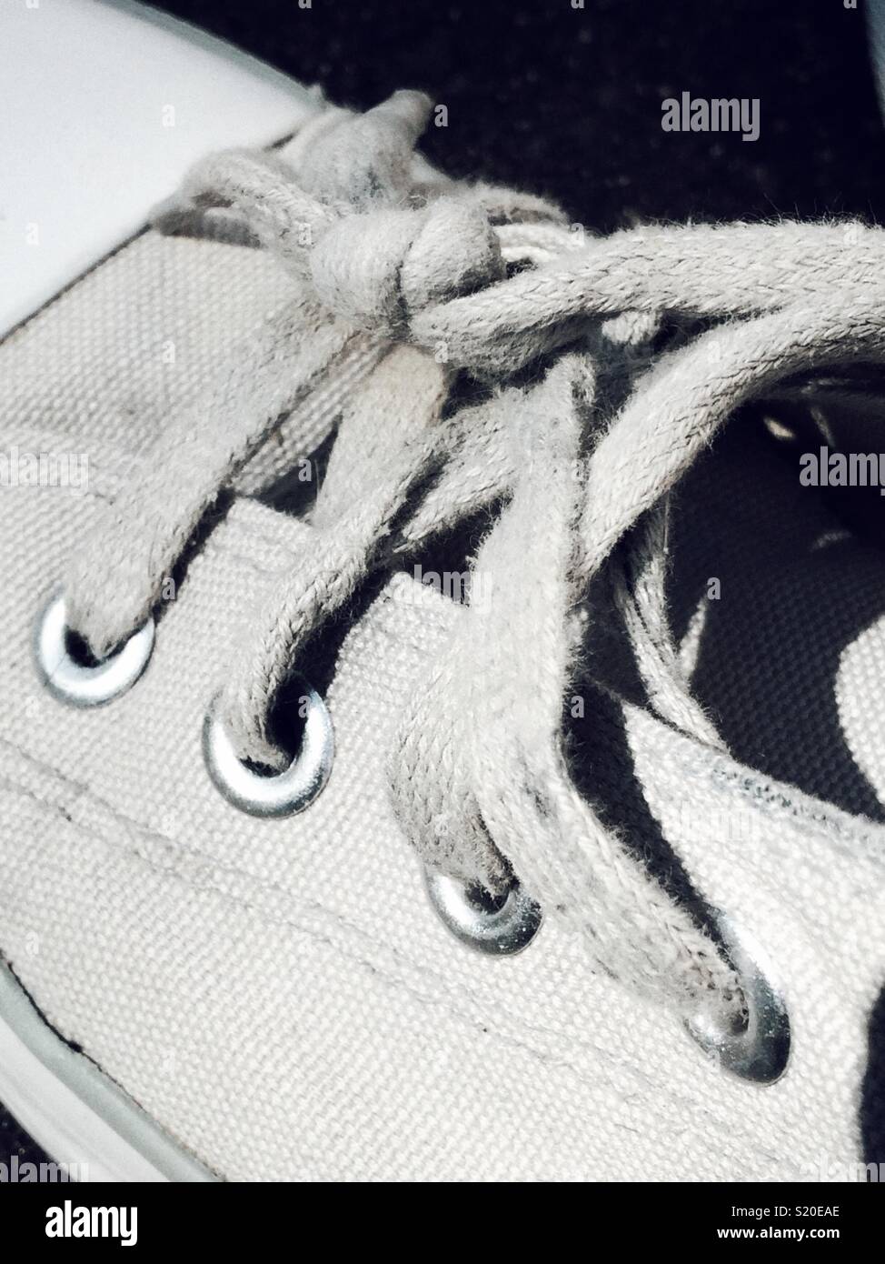Laced up grey basketball boots Stock Photo