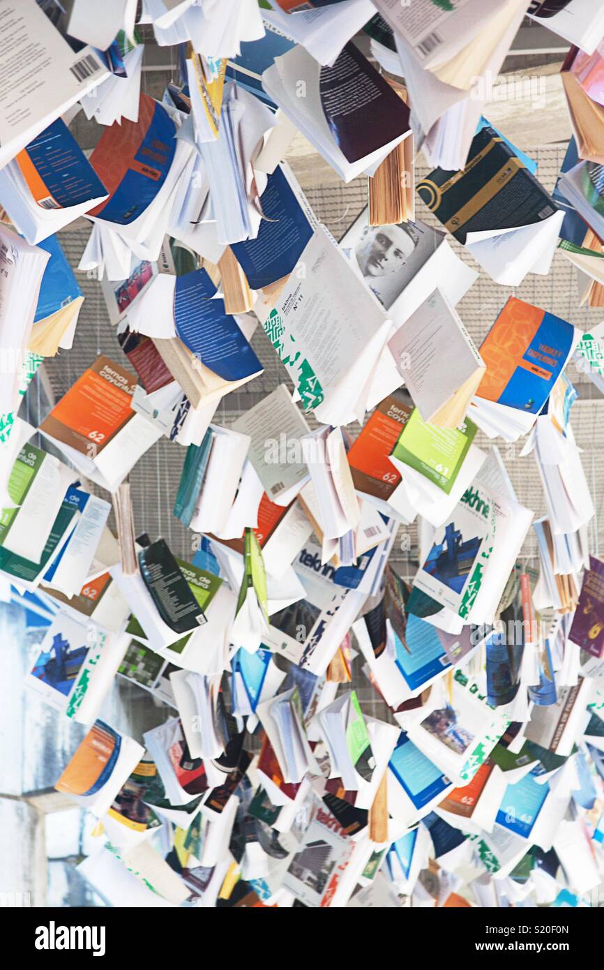 Large group of Books hanging from a ceiling - Smartphone Captured Stock Image