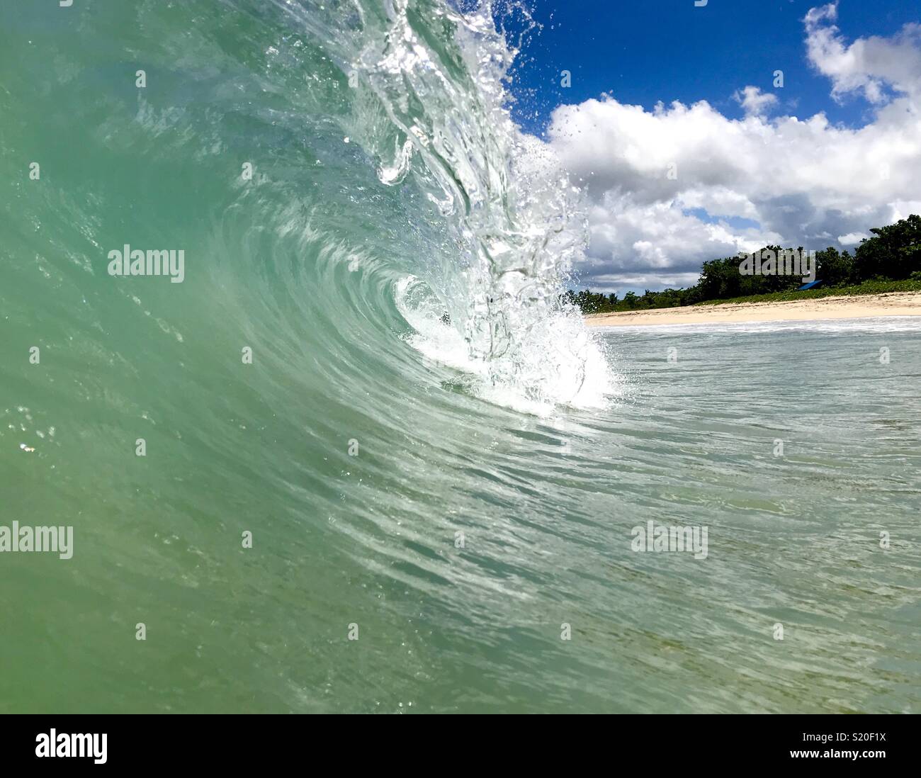 Inside of a wave breaking. Fiji. - Smartphone Captured Stock Image