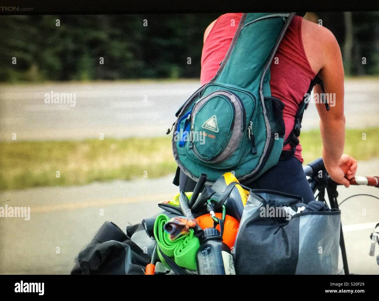 Man on a bicycle with a mandolin - Smartphone Captured Stock Image