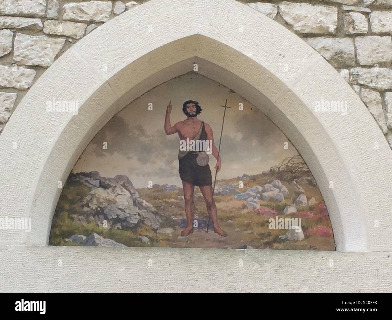 Fresco on the front wall of the Church of San Giovanni del Timavo. Duino,  Trieste, Italy. - Smartphone Captured Stock Image