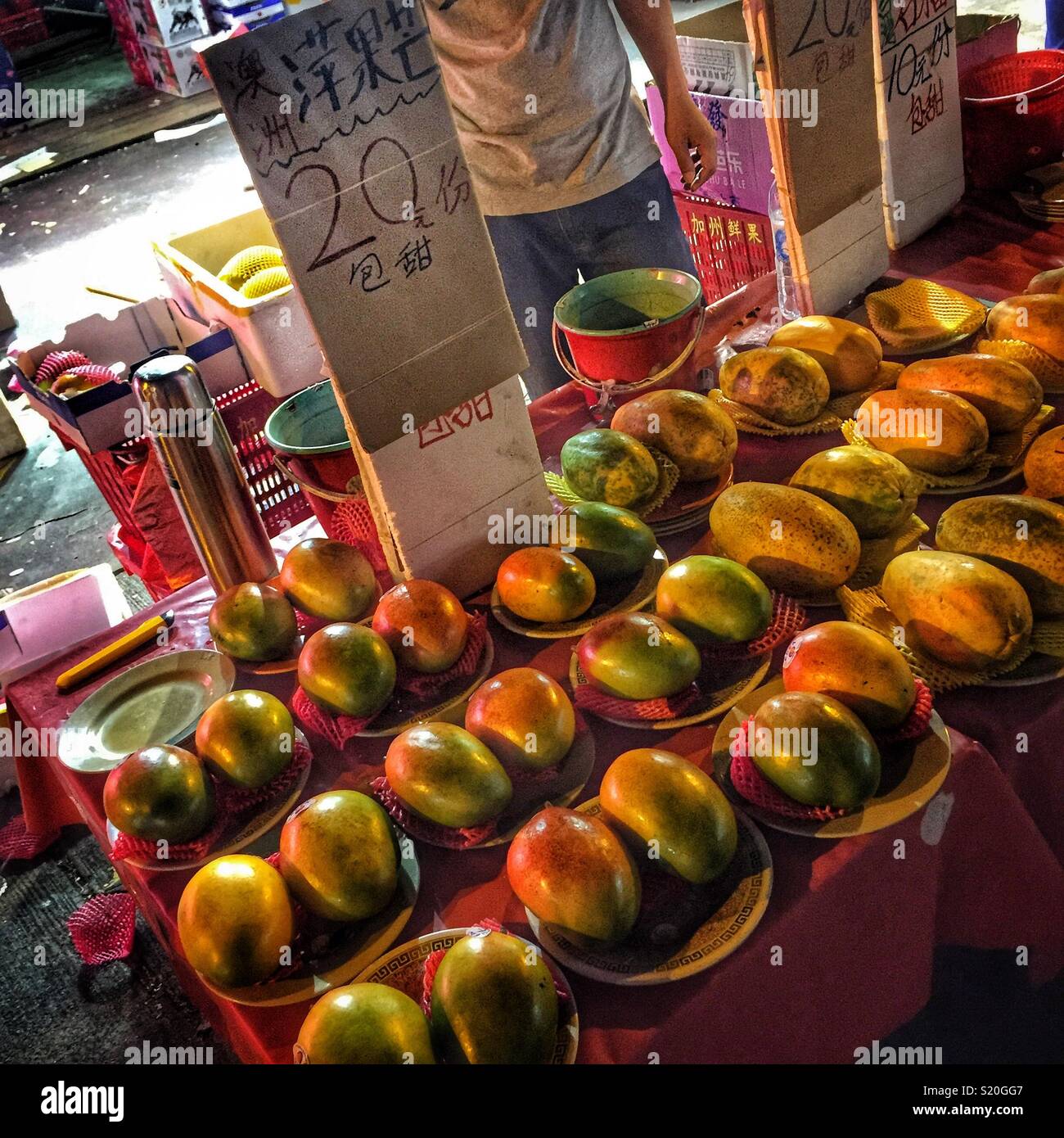 Mangoes for sale in a street market in Yuen Long, New Territories, Hong Kong - Smartphone Captured Stock Image