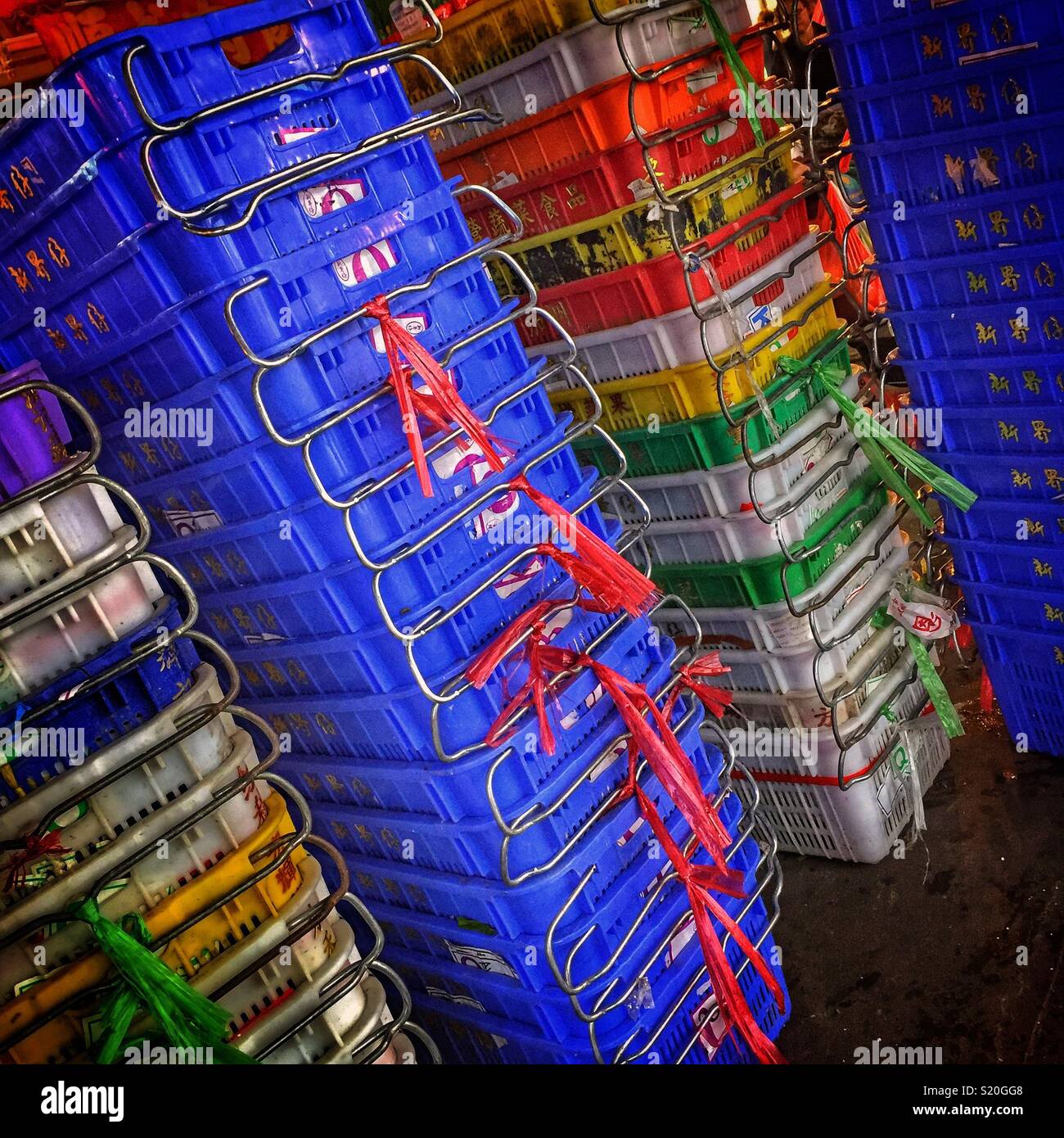 Plastic produce baskets in a street market in Yuen Long, New