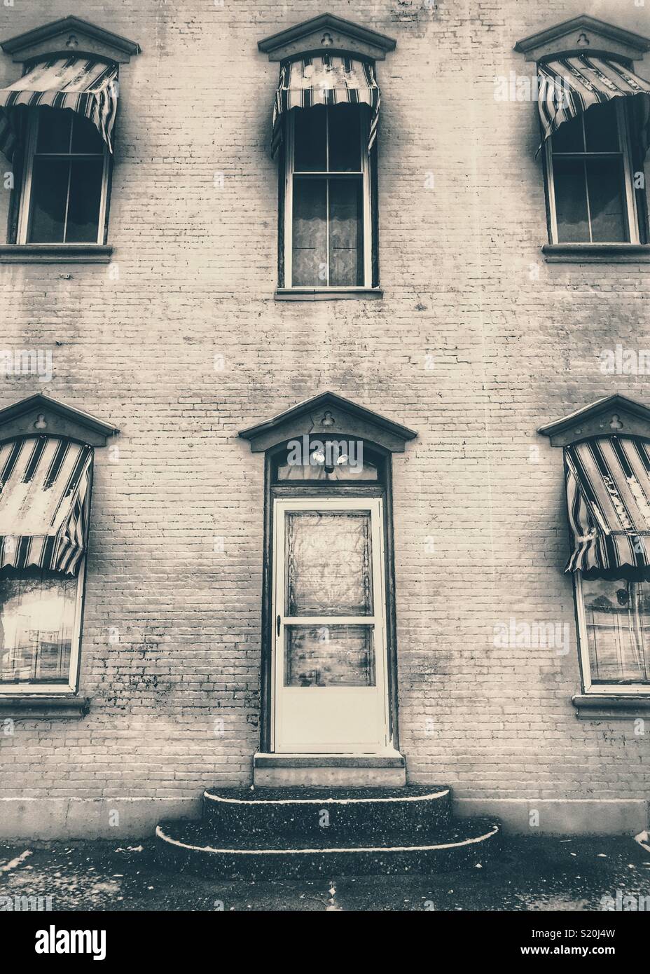 Old brick building in sepia tone - Smartphone Captured Stock Image