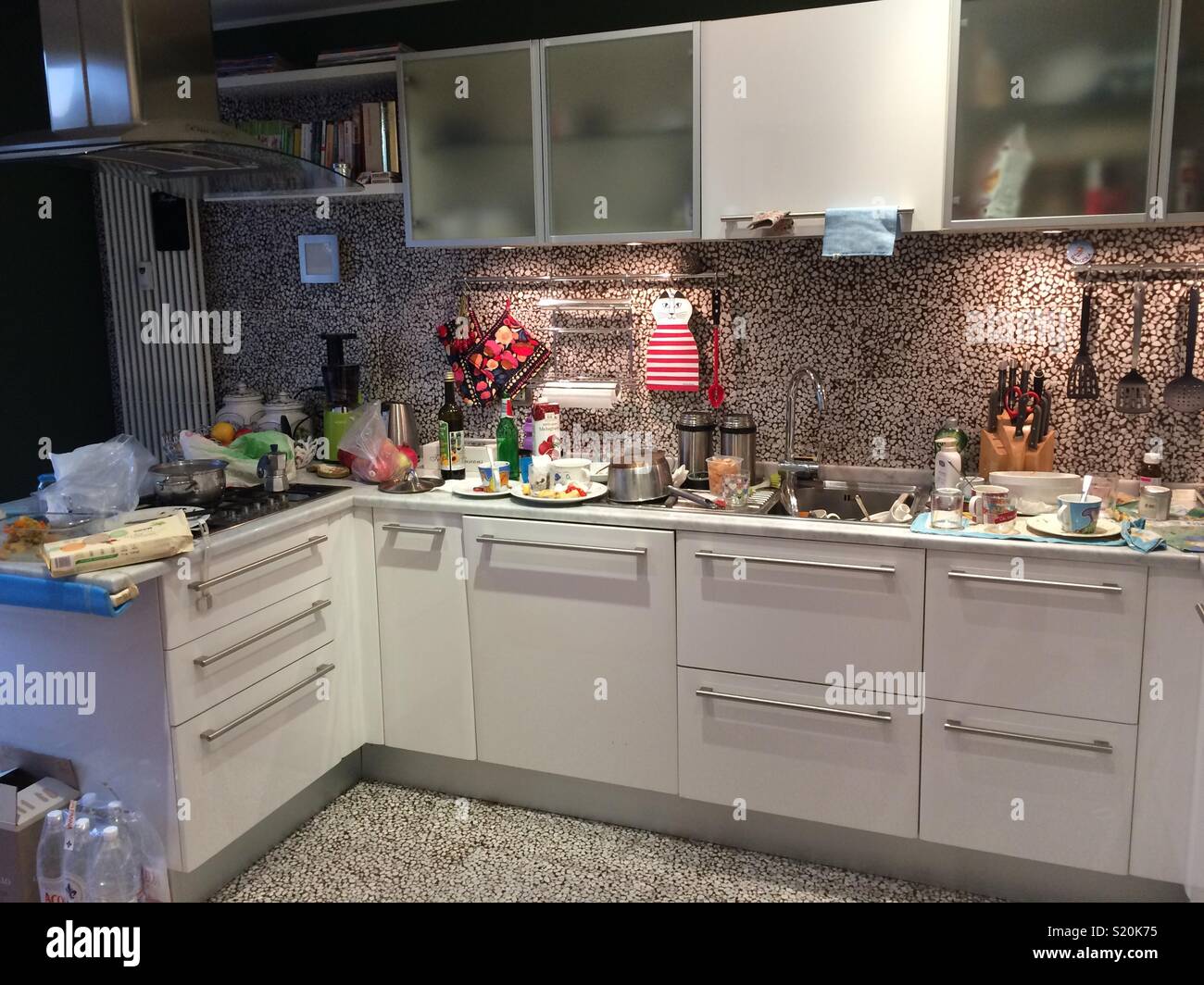 Some clean-up needed in the kitchen. - Smartphone Captured Stock Image