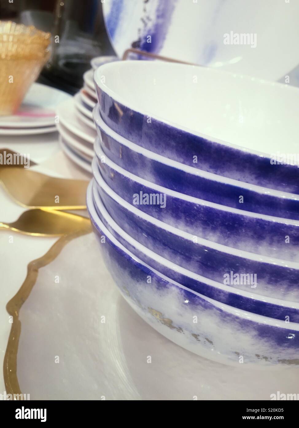 Close up of stacked bowls and tableware, USA - Smartphone Captured Stock Image