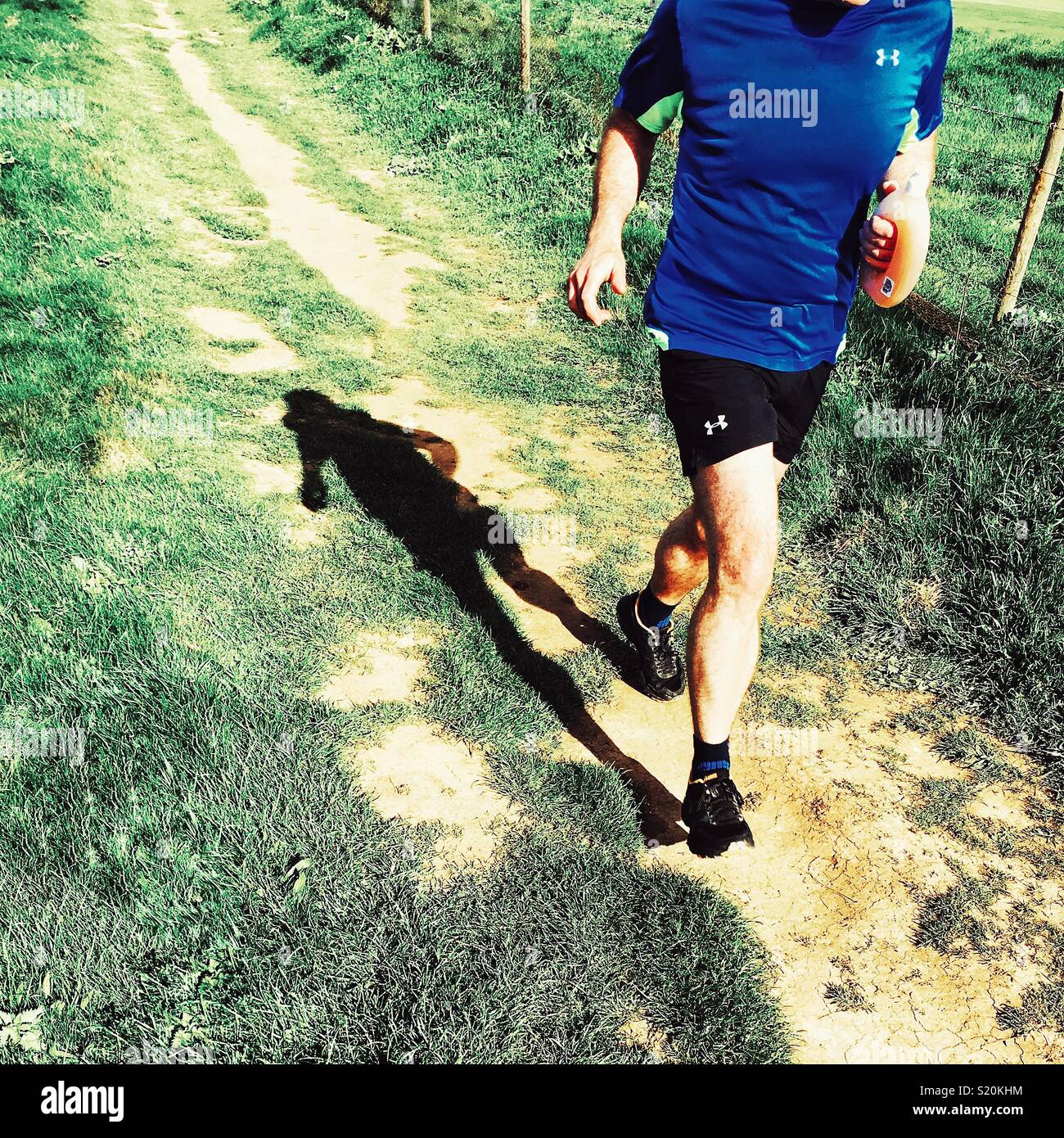 Man running for exercise - Smartphone Captured Stock Image