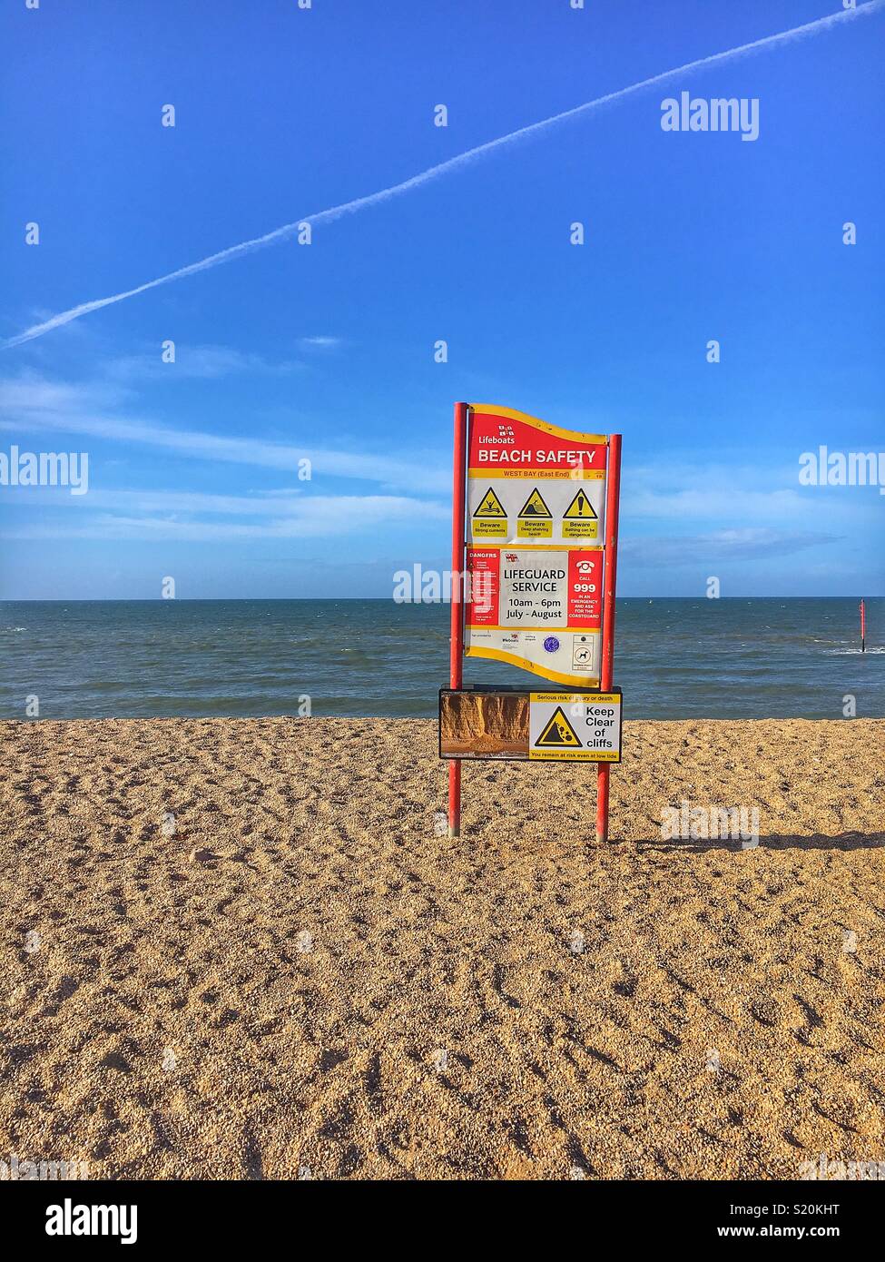 Beach safety notice West Bay Dorset UK Stock Photo