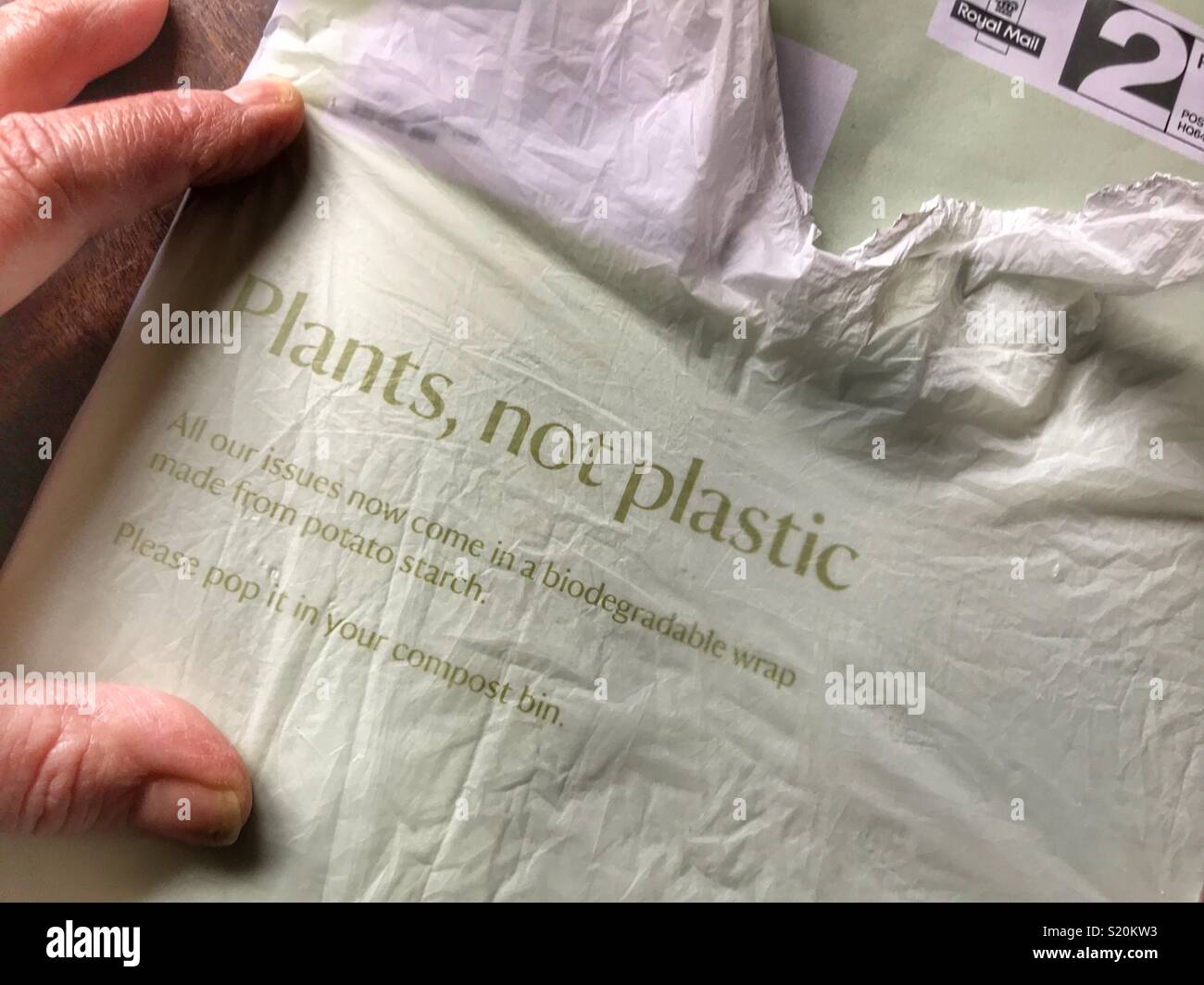 Plants not Plastic, recyclable envelope made from biodegradable potato starch - Smartphone Captured Stock Image