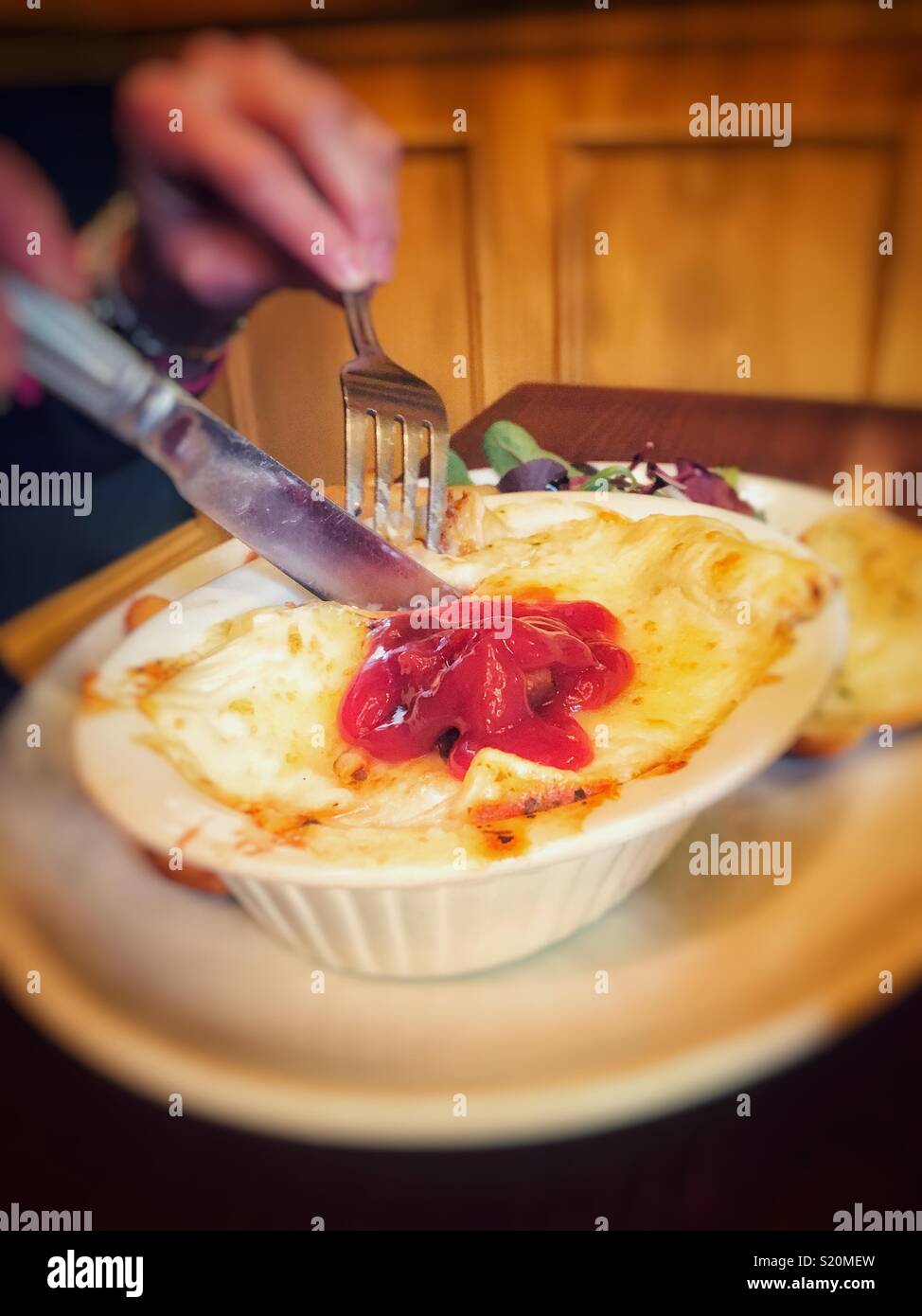 Good pub grub lasagne with tomato ketchup Stock Photo