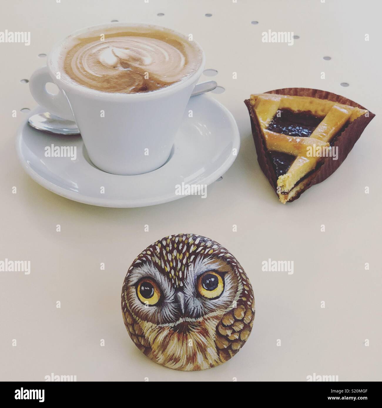 Breakfast with my stone owl - Smartphone Captured Stock Image