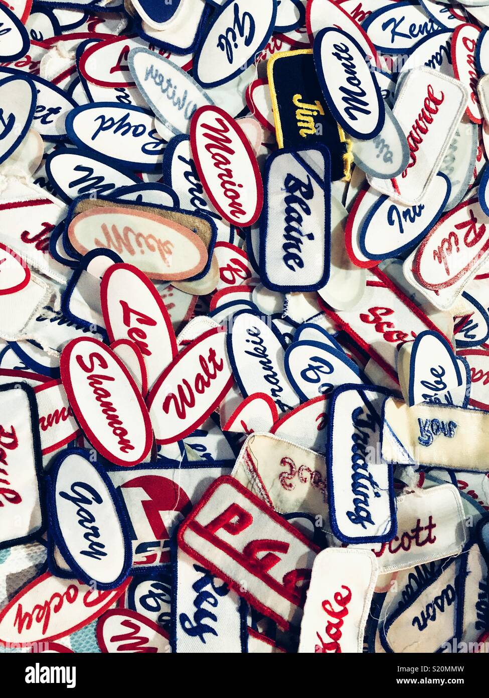 Embroidered  vintage name patches. for sale at the Fremont Sunday market in Seattle - Smartphone Captured Stock Image
