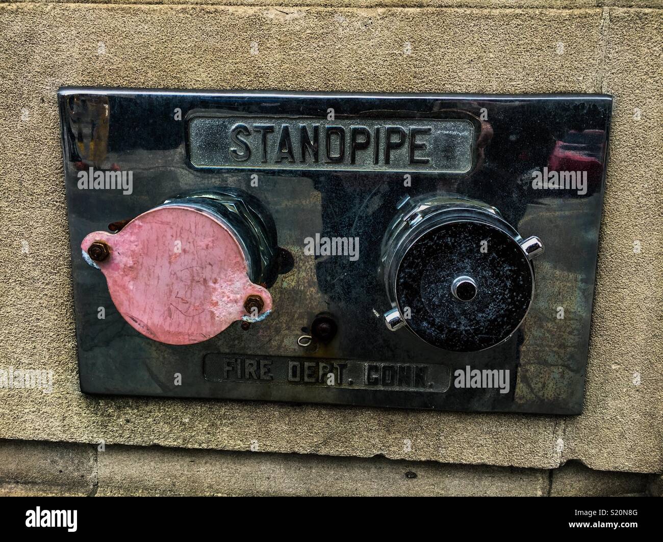 Fire hydrant in modern building - Smartphone Captured Stock Image