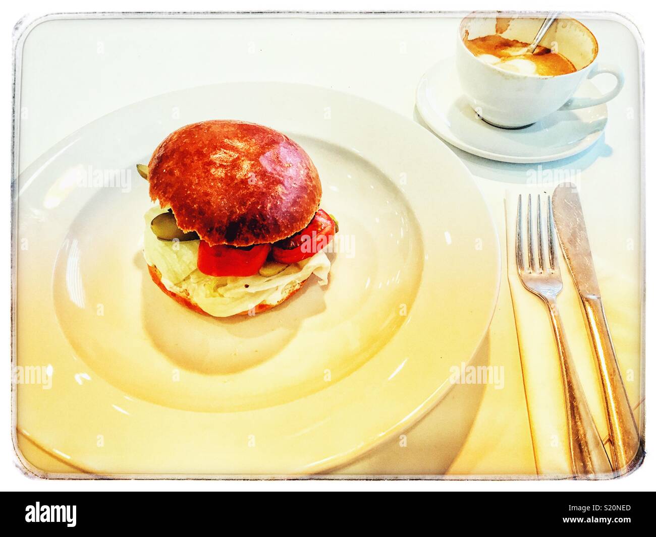 Waitrose Cafe vegetable burger and cappuccino coffee Stock Photo Alamy