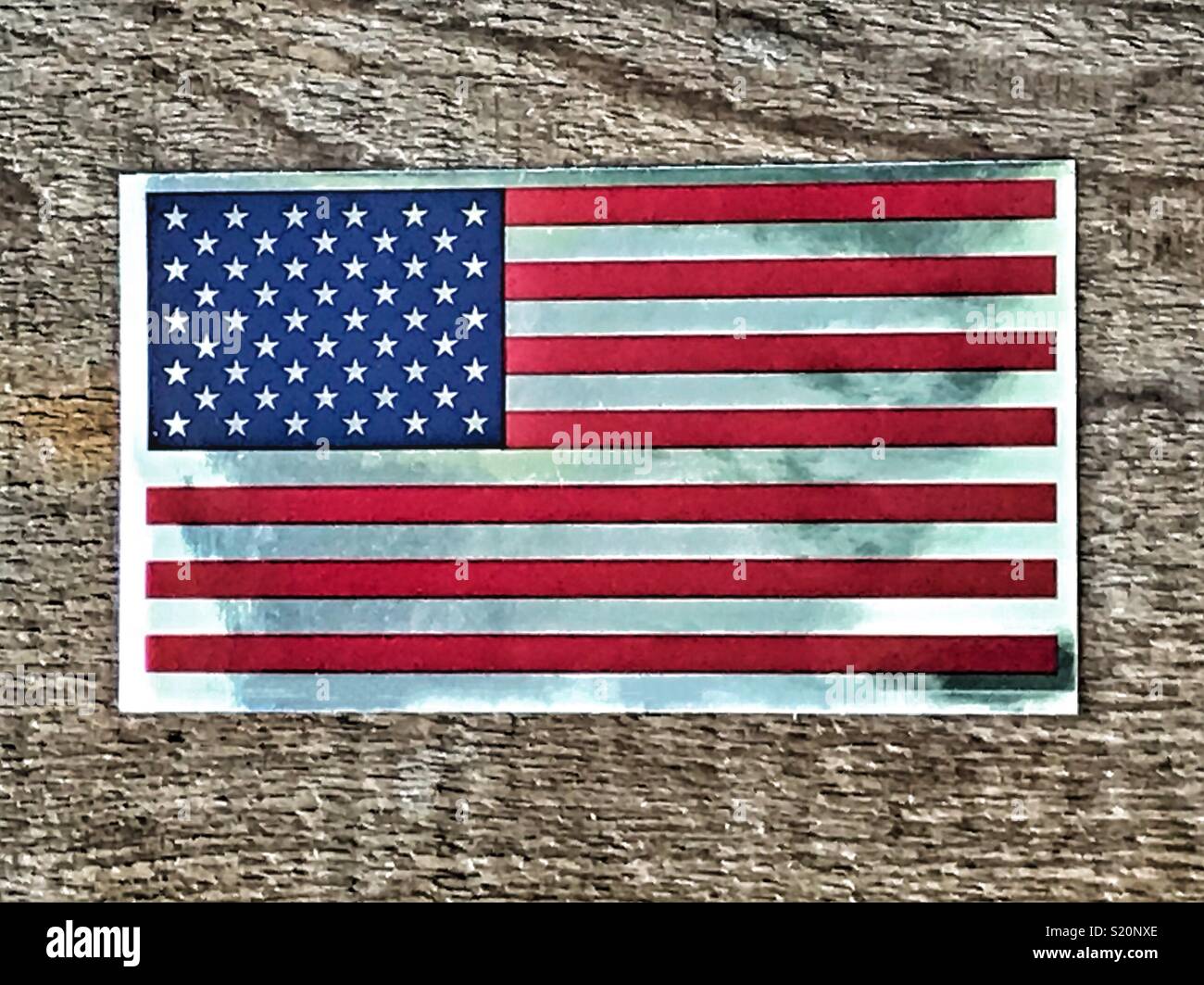 US Flag motif against weathered wood background - Smartphone Captured Stock Image