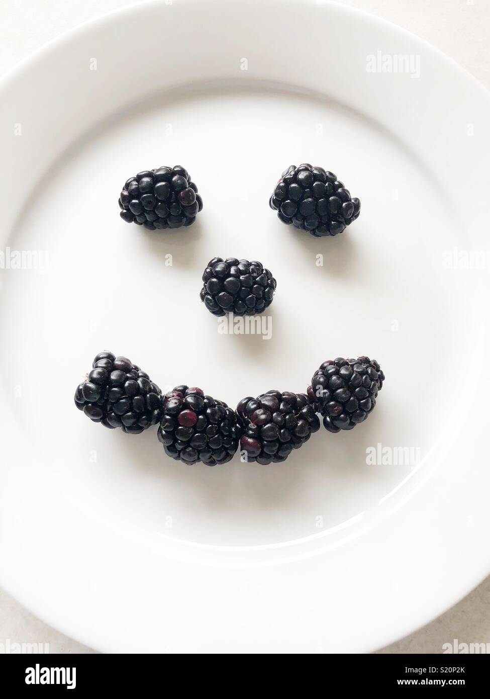 Blackberry smile Stock Photo