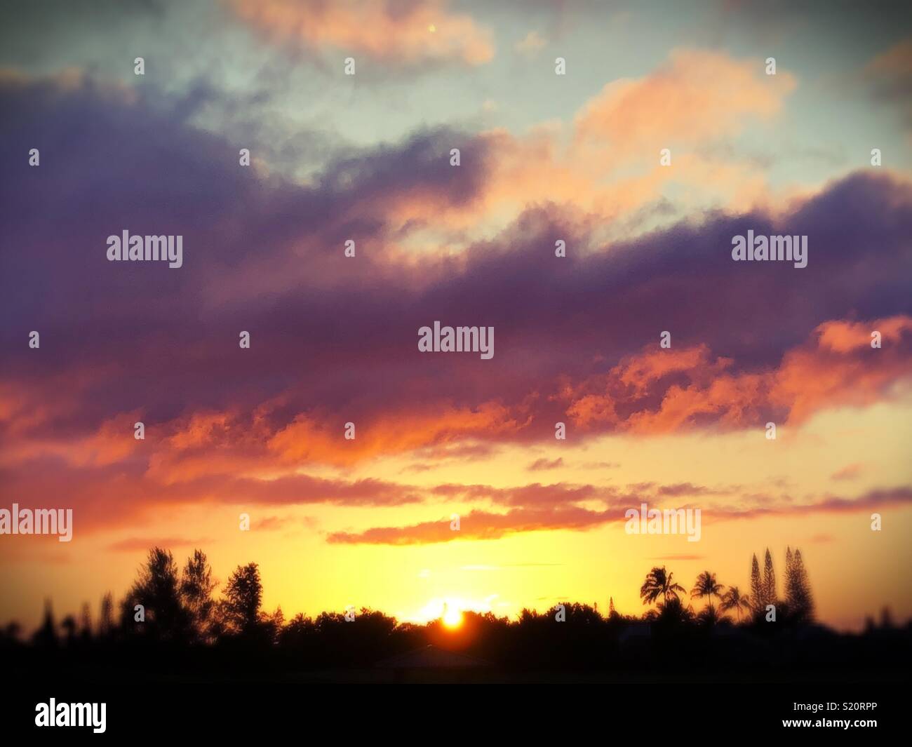 Sunset in Hawaii with colorful clouds - Smartphone Captured Stock Image