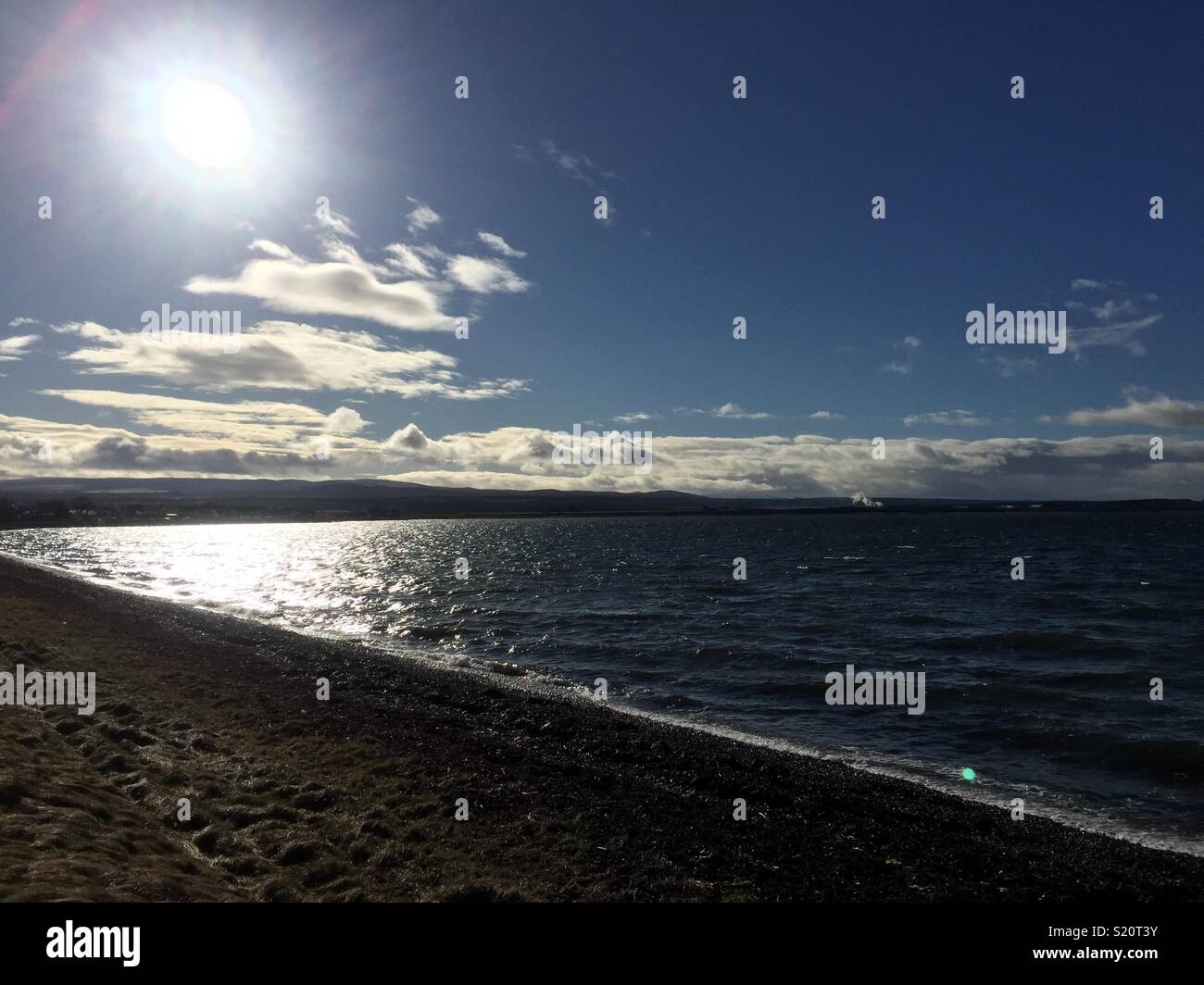 Winter sun on the beach, Ardersier, near Inverness Stock Photo