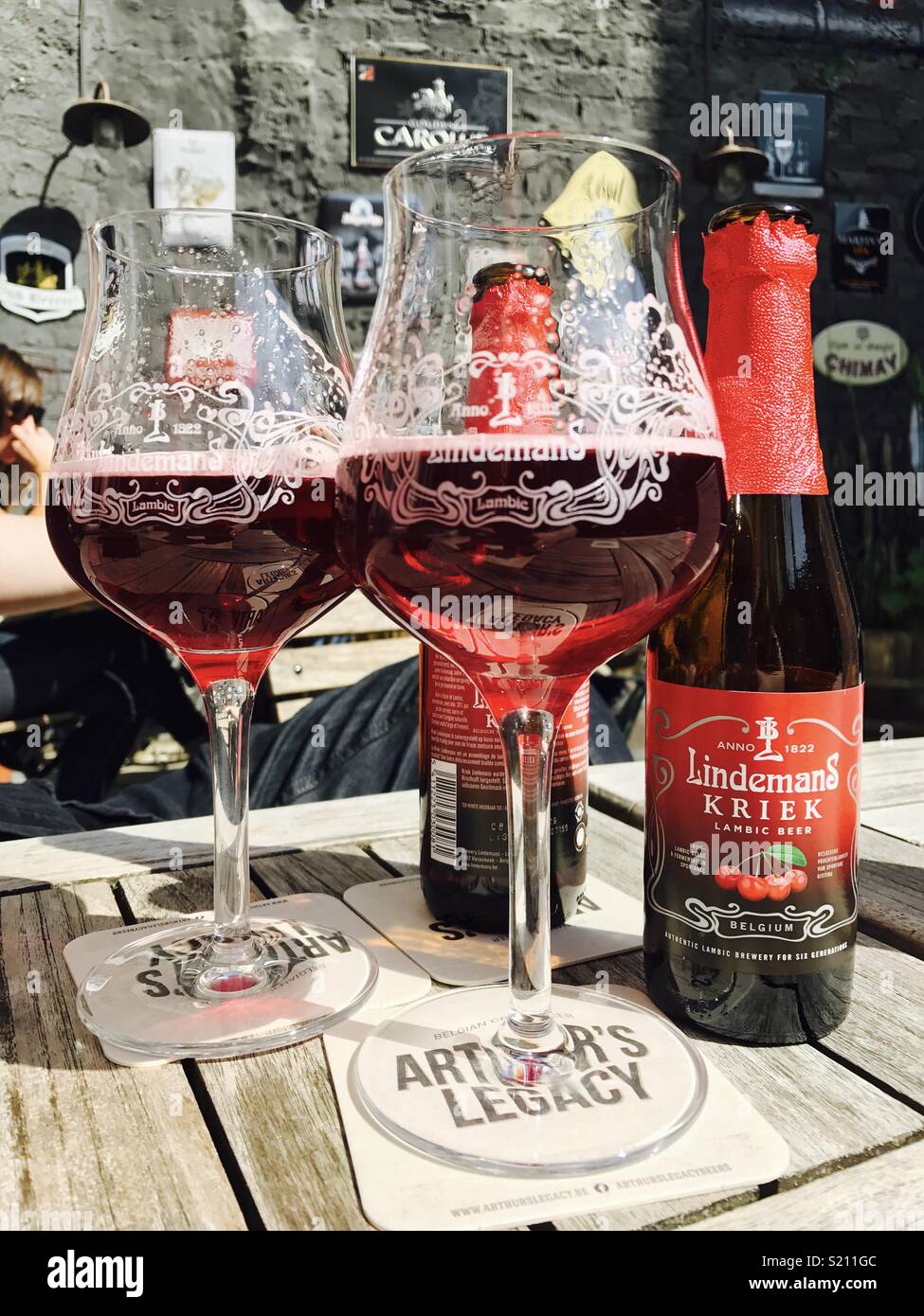 Drinking beer in Bruges Stock Photo Alamy