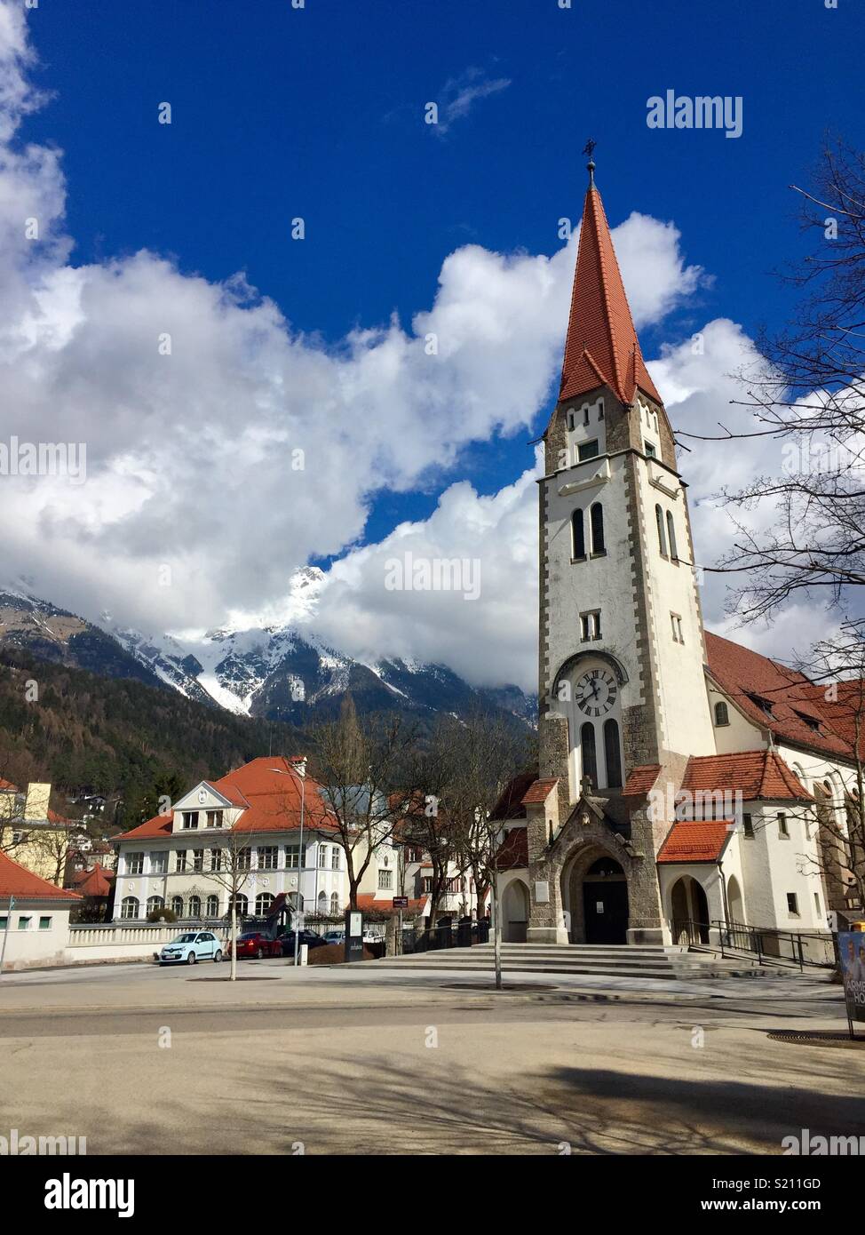 Church by the mountain, Innsbruck, Austria - Smartphone Captured Stock Image