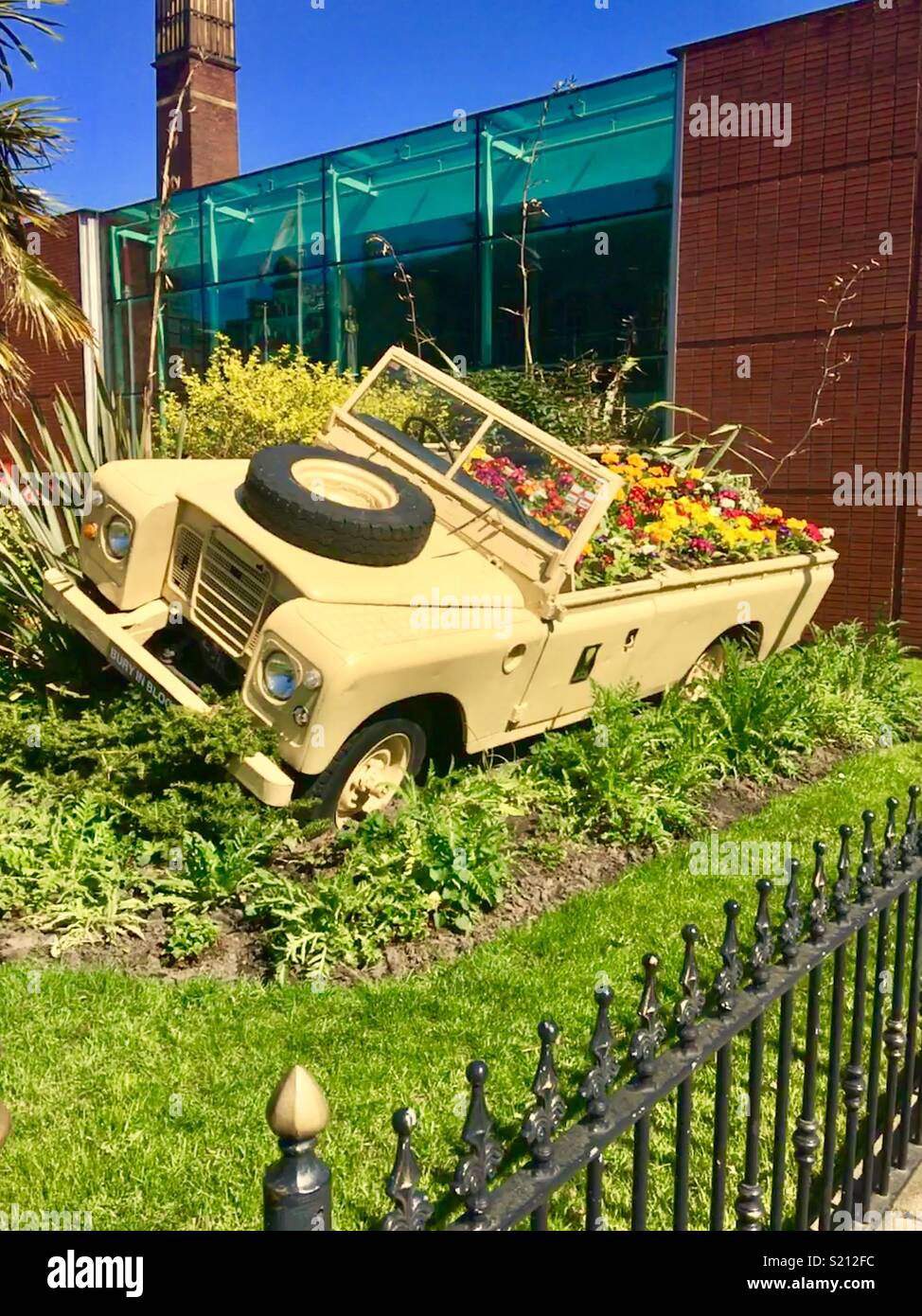 Land Rover full of flowers in Bury Stock Photo Alamy