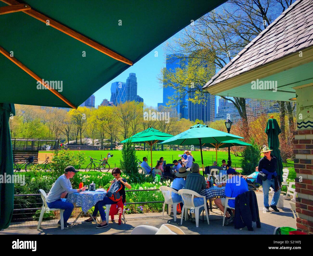 The ballfields café offers outdoor dining in a casual atmosphere near Central Park softball diamonds, NYC, USA - Smartphone Captured Stock Image