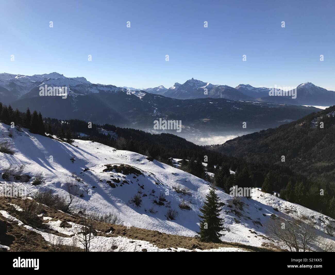 Hiking in the French Alps during winter Stock Photo