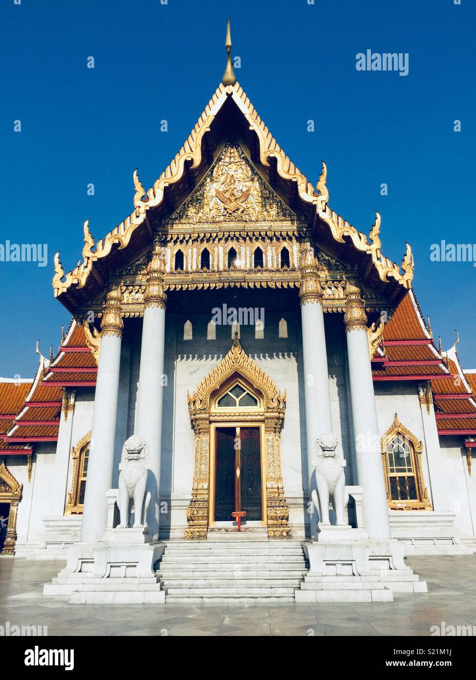 Marble Temple in Bangkok with Blue Skies Stock Photo - Alamy