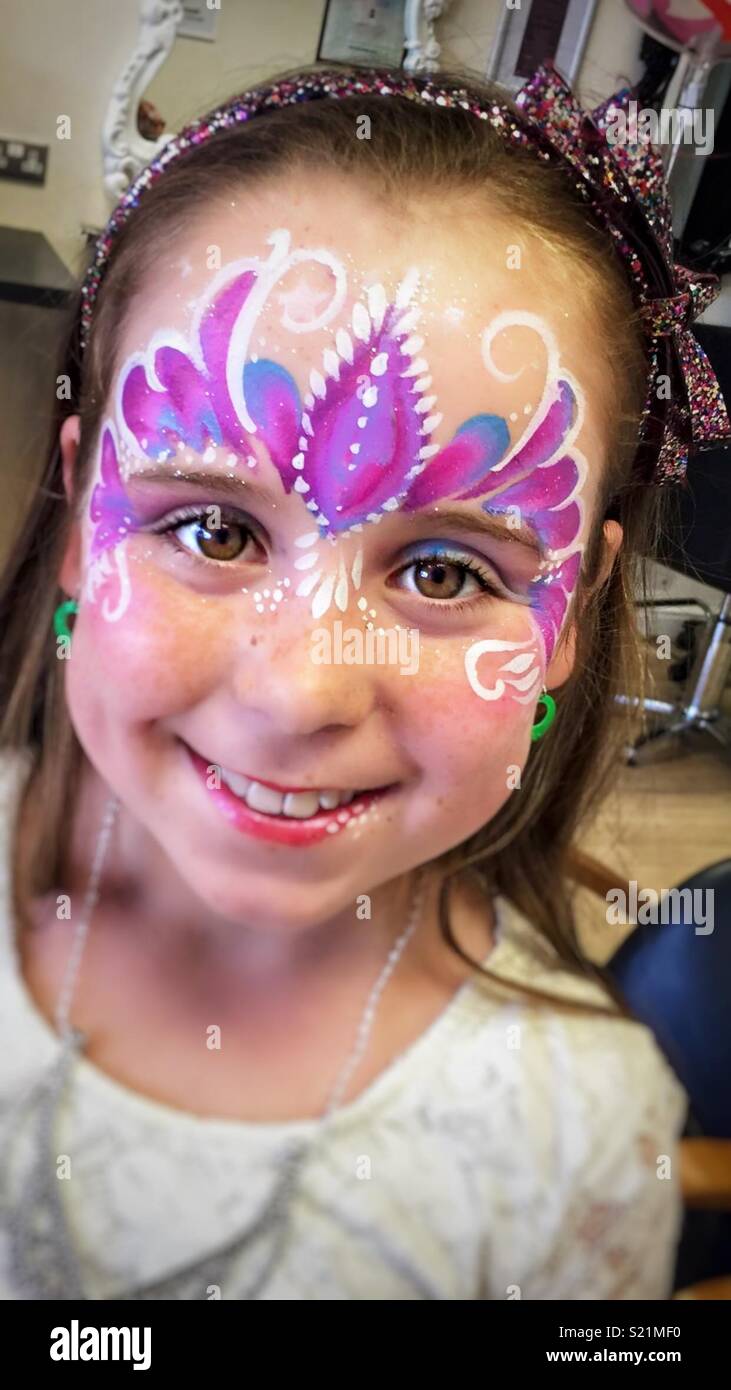 Girl with facepaint at party Stock Photo Alamy