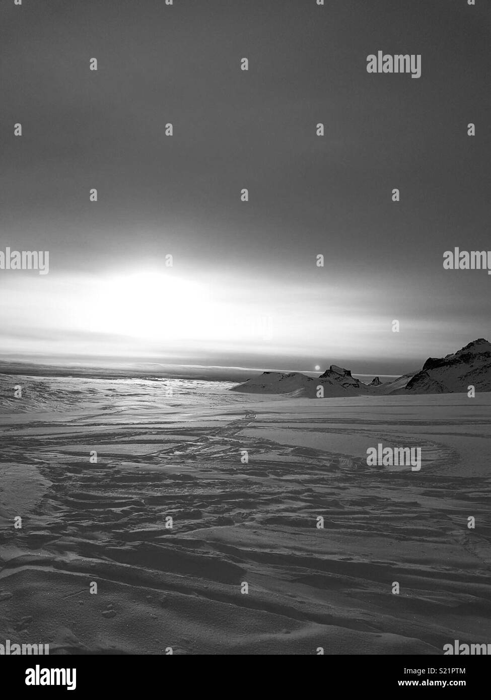 Iceland on the glacier overlooking horizon at sunset Stock Photo