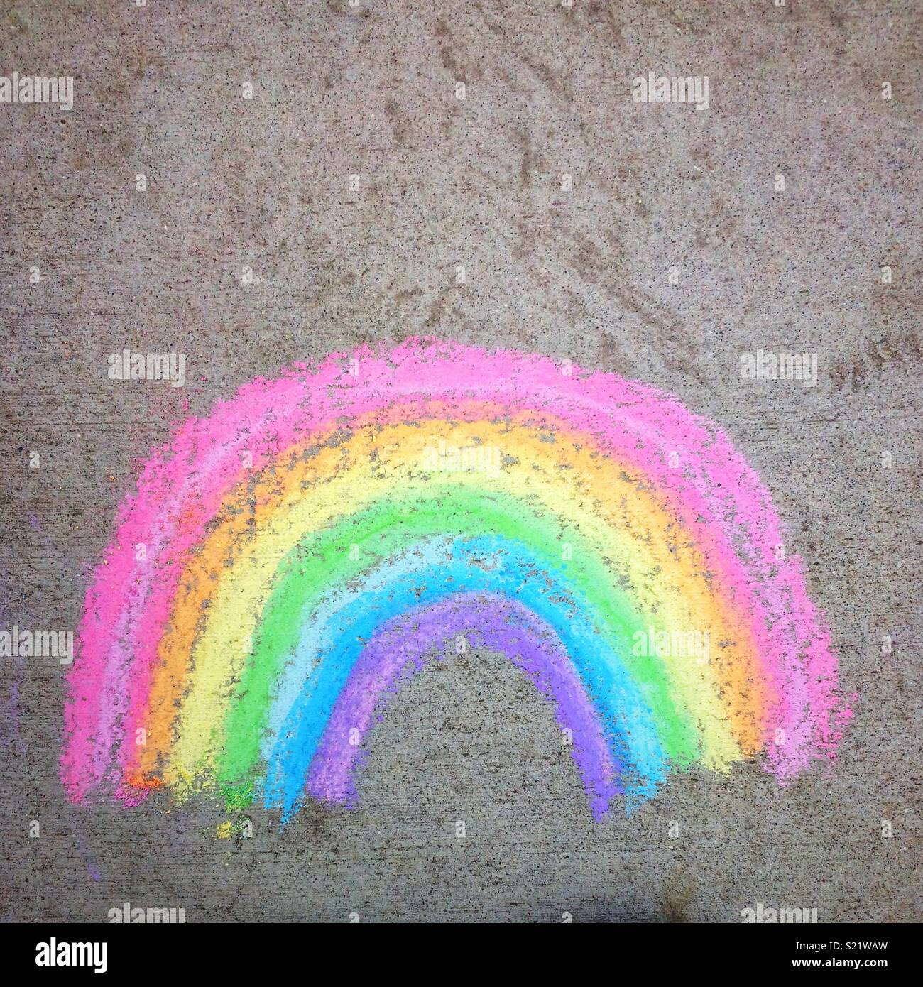 Chalk Rainbow on sidewalk Stock Photo Alamy