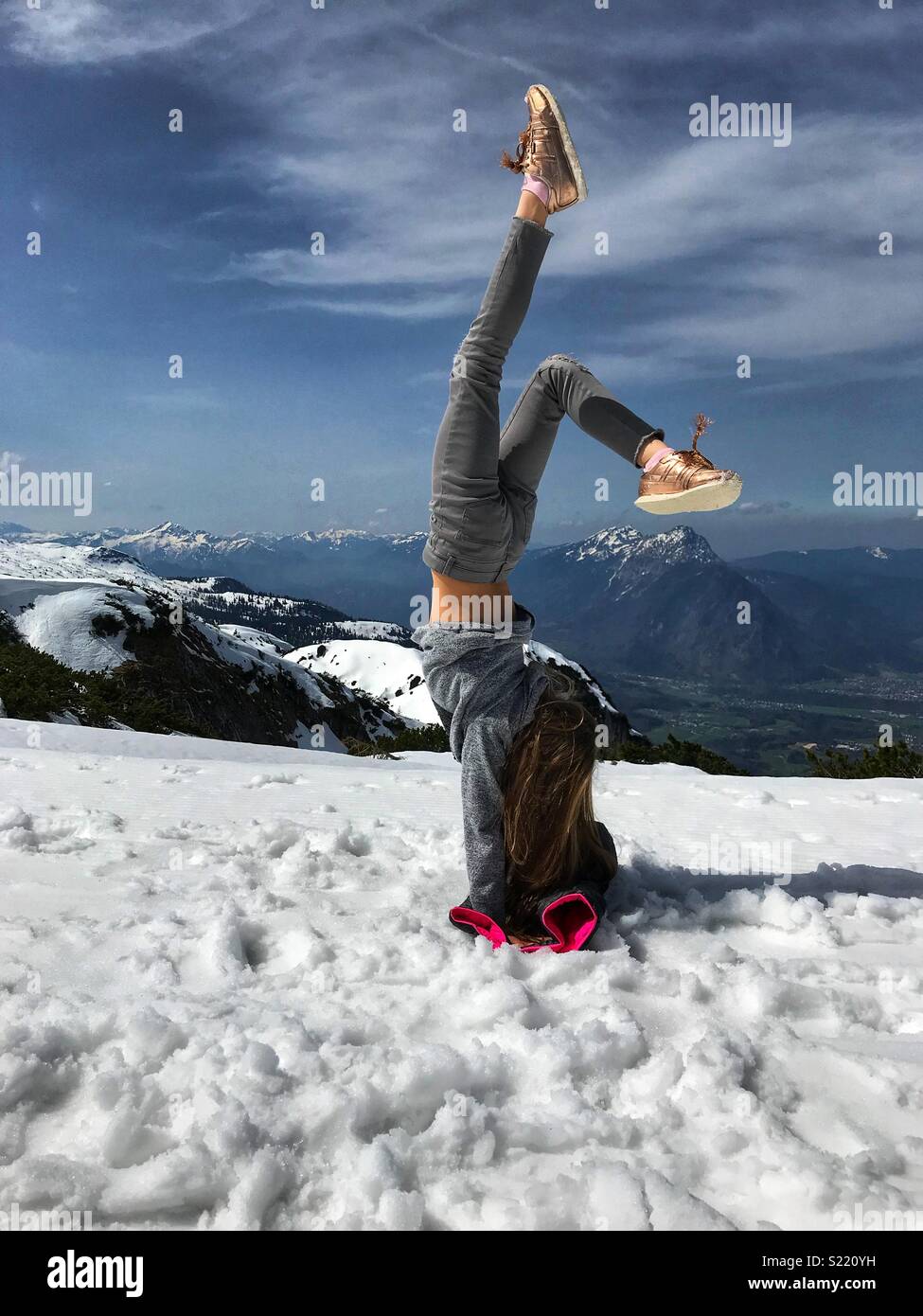 Handstand on mountain top Stock Photo Alamy