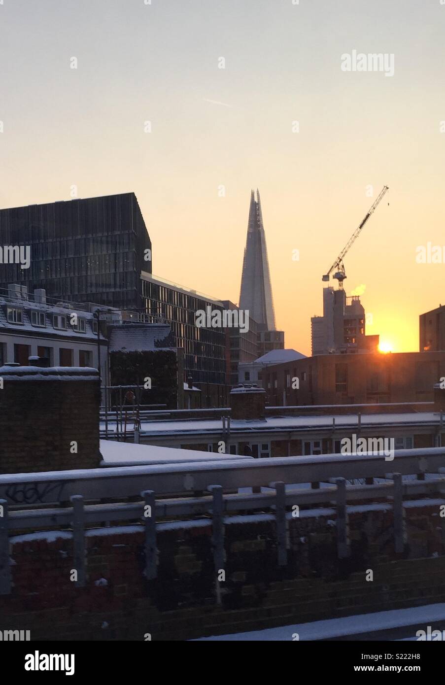 Sunrise over London in the snow on a clear day. Stock Photo