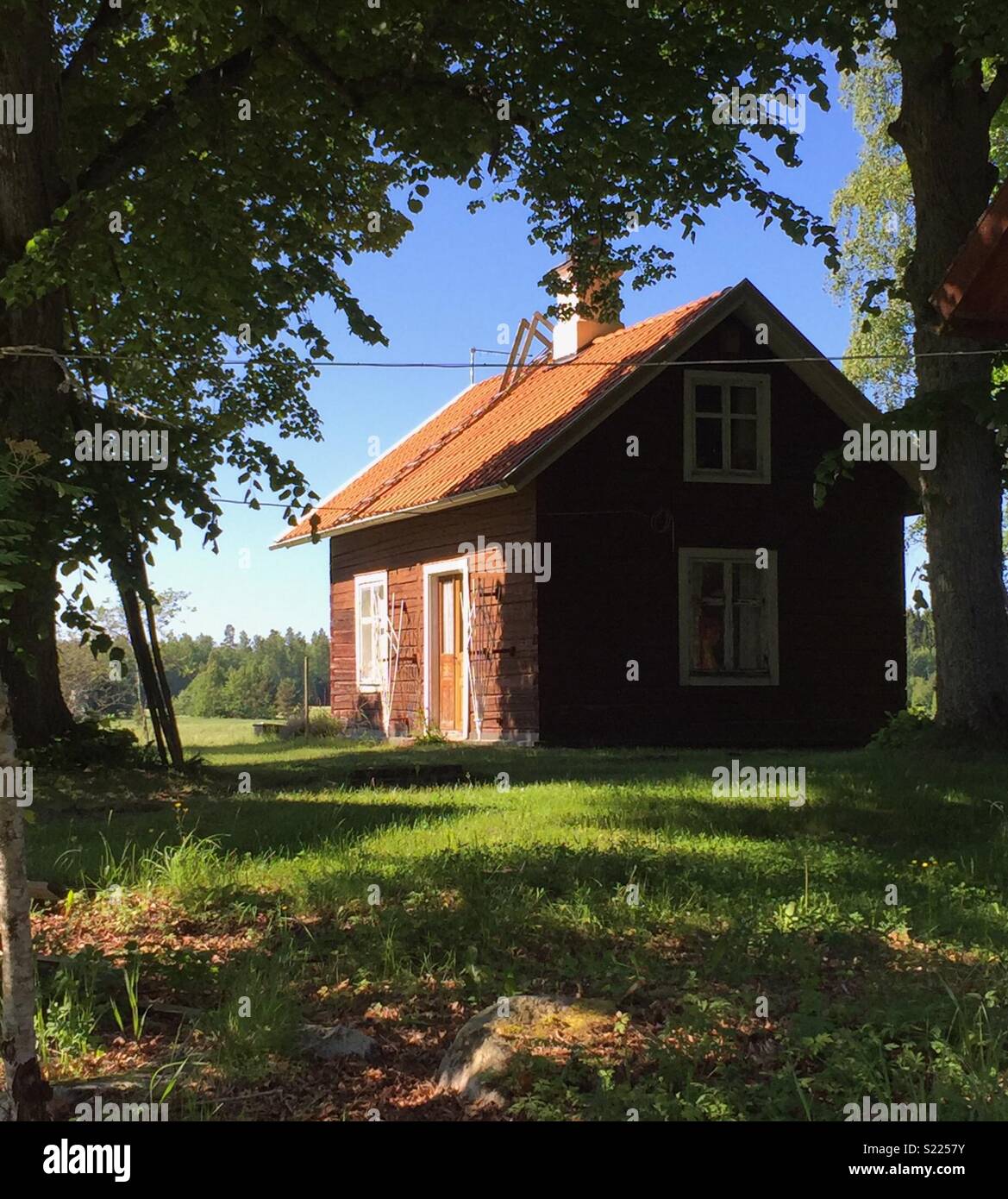 Old log house at the swedish countryside. Stock Photo