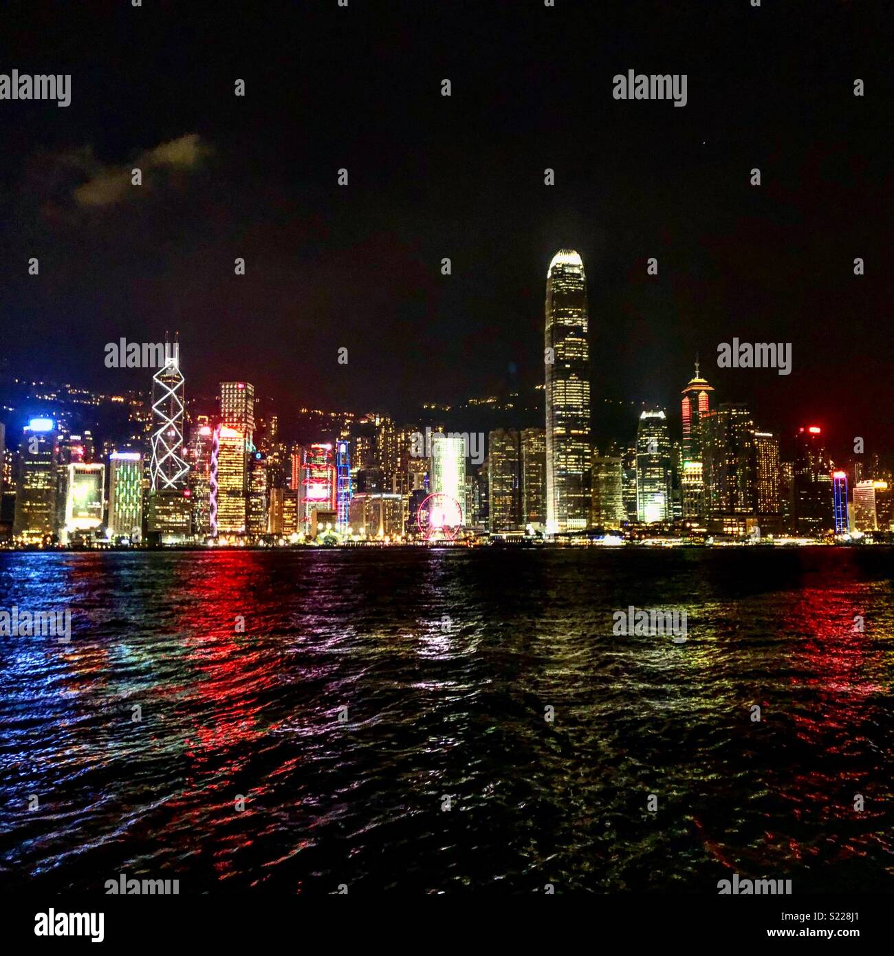 Hong Kong’s Victoria Harbour at night Stock Photo - Alamy