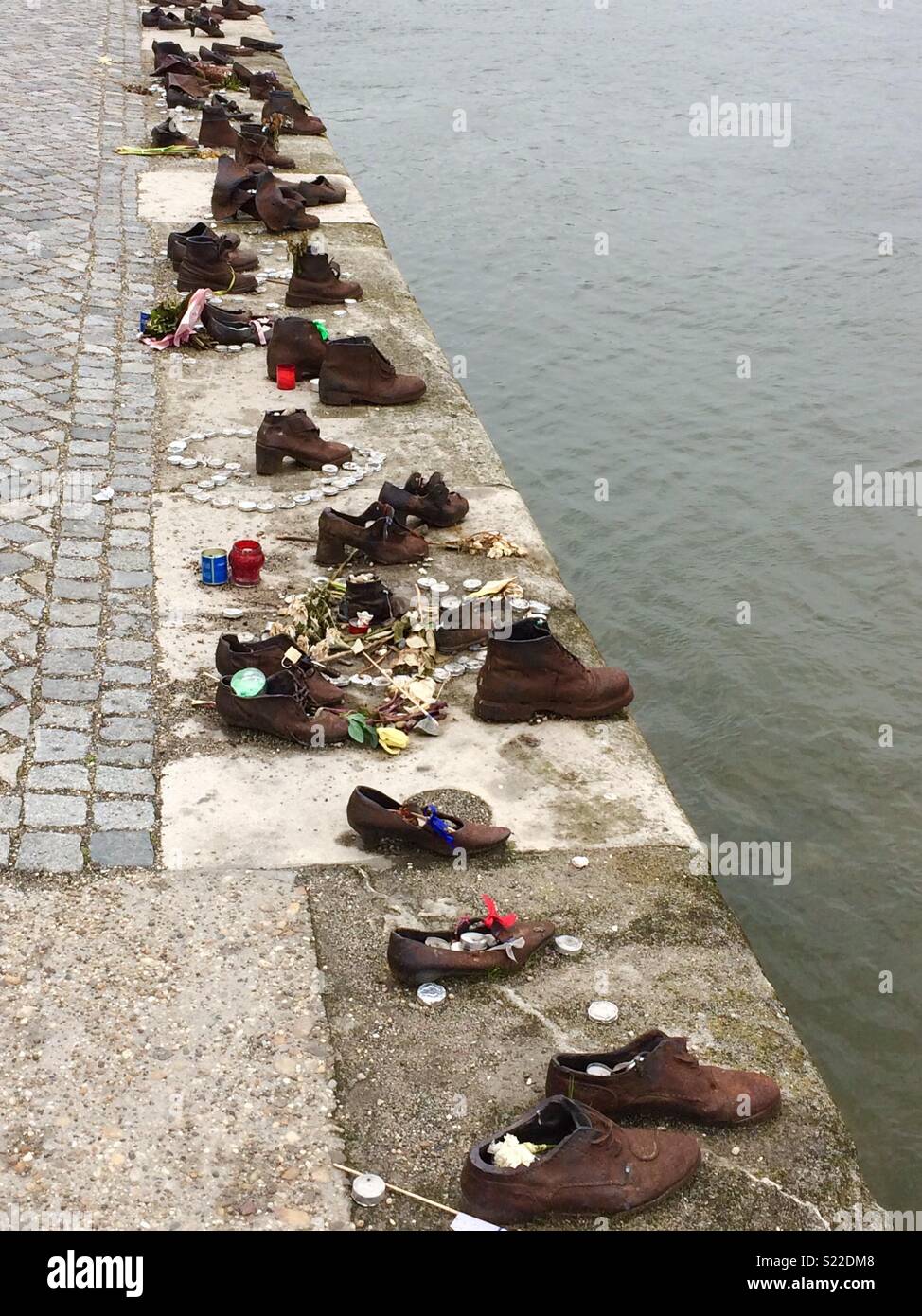 “ The Shoes” in memory of the victims shot into The Danube by arrow cross militiamen, during World War 11 Stock Photo