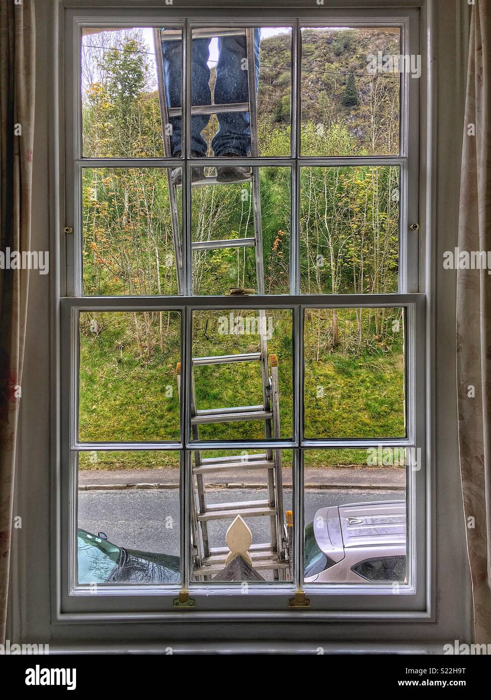 Window cleaner - Smartphone Captured Stock Image