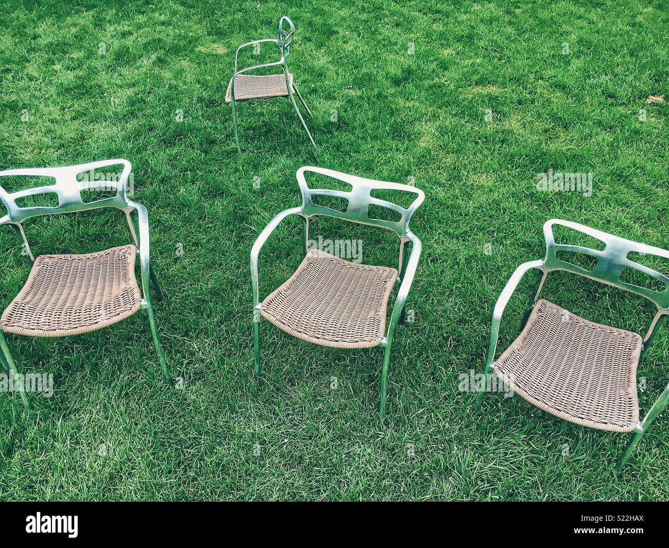 Chairs on grass Stock Photo Alamy