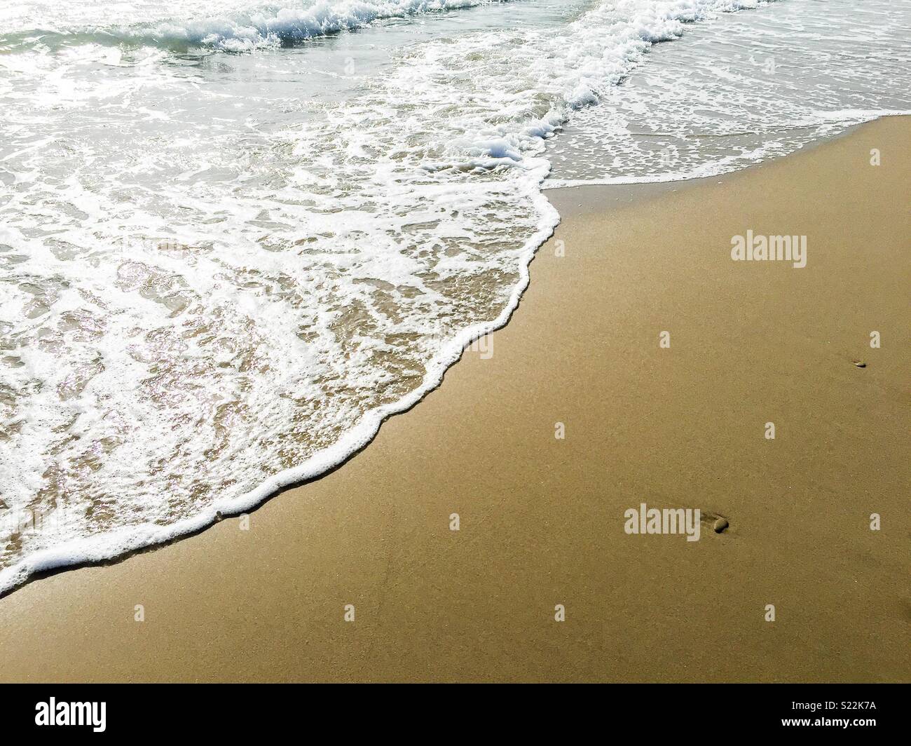 Water arriving at the beach - Smartphone Captured Stock Image