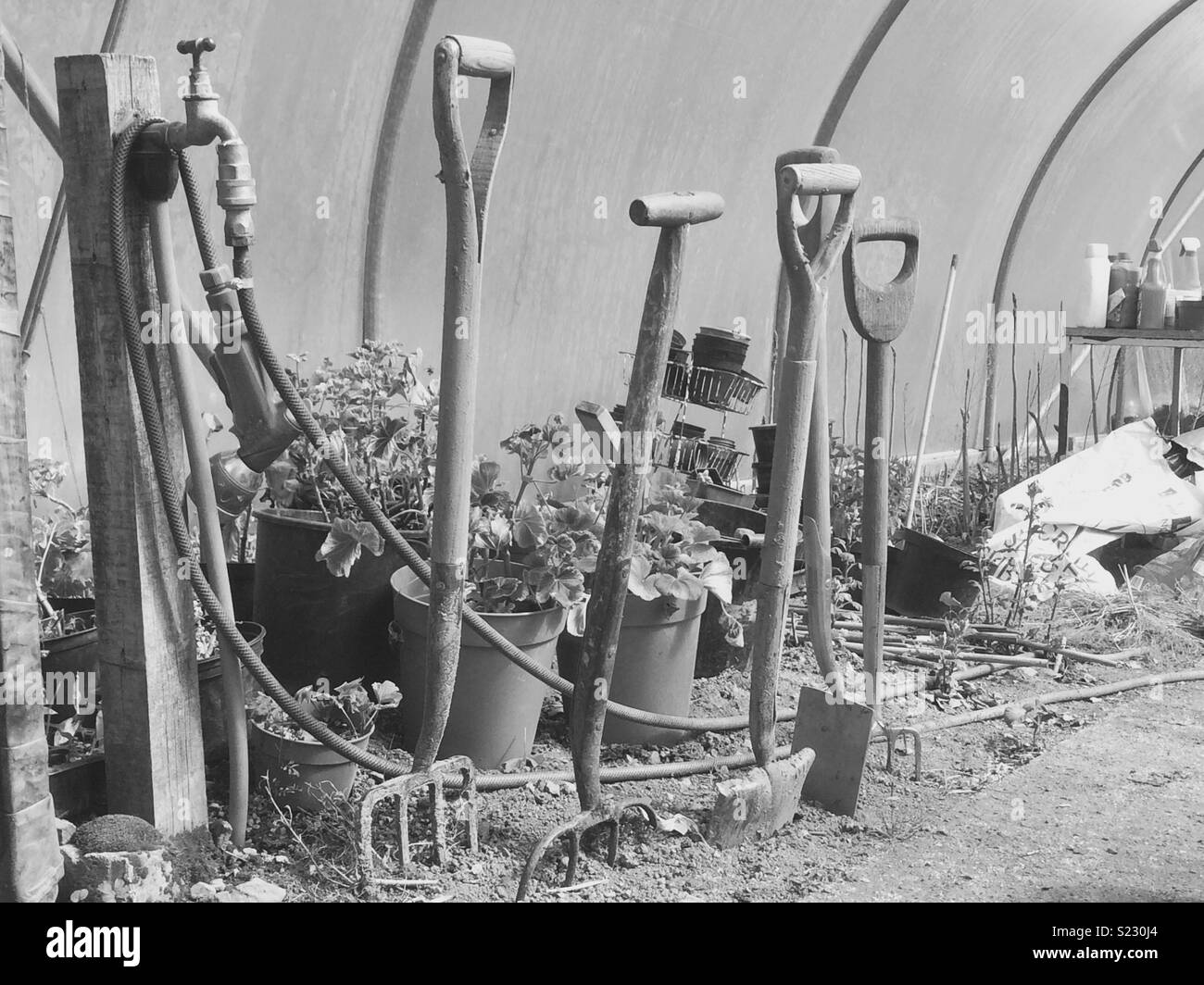 Allotment tap Black and White Stock Photos & Images - Alamy