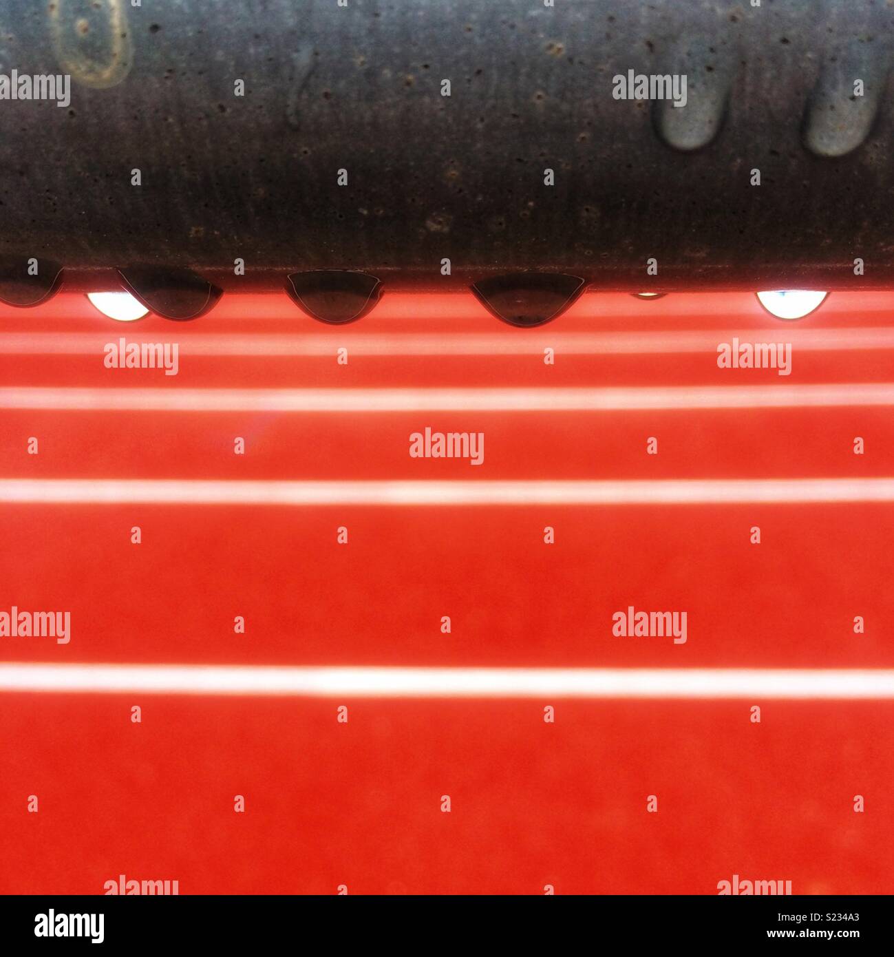 Drops of water at an athletic stadium - Smartphone Captured Stock Image