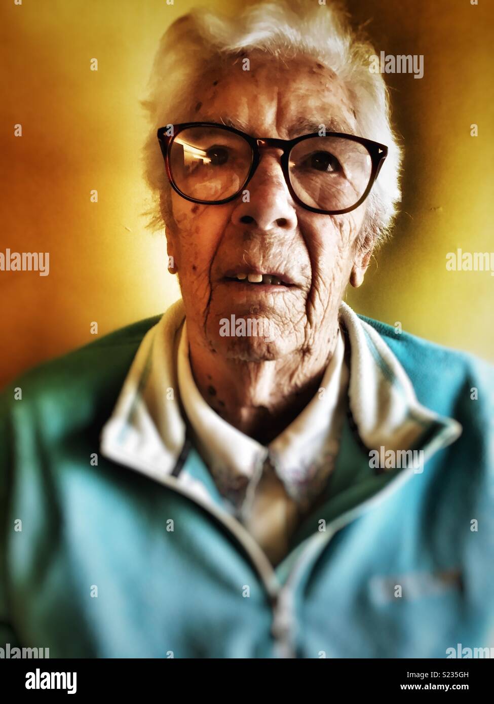 Woman suffering from macular degeneration in her eyes - Smartphone Captured Stock Image