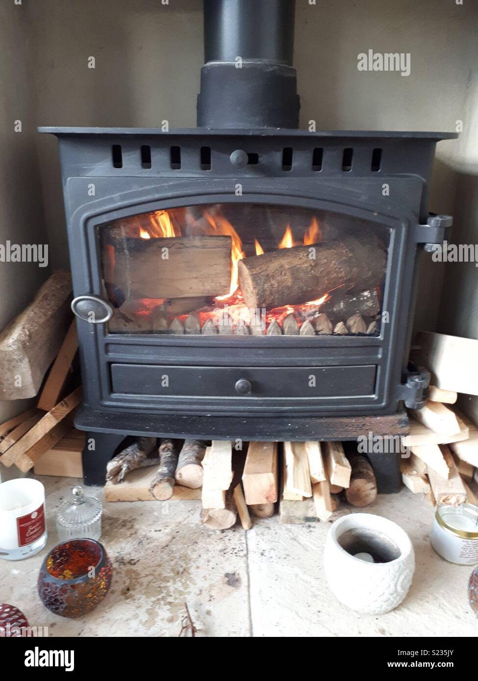 A log burner Stock Photo Alamy